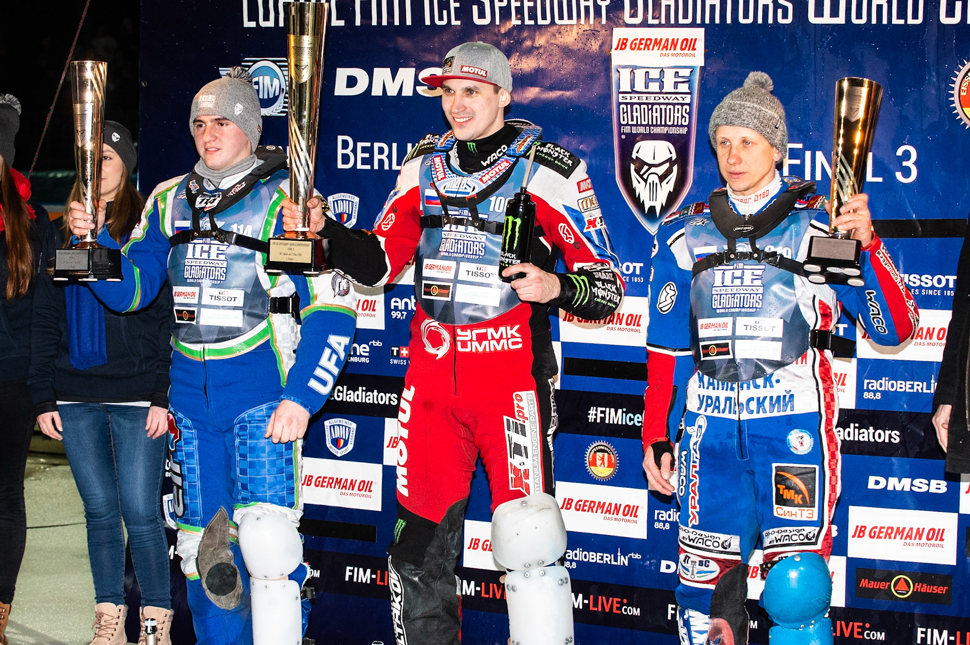 Photo: Ian Charles

Saturdays's top three (l-r) Dinar Valeev (114) (2nd), Dmitri Koltakov (106) (Winner) Dmitri Khomitsevich (919) (3rd) 

FIM Ice Speedway Gladiators World Championship, Final 3.1, Horst-Dohm Eisstadion, Berlin, Germany Saturday  2  March  2019