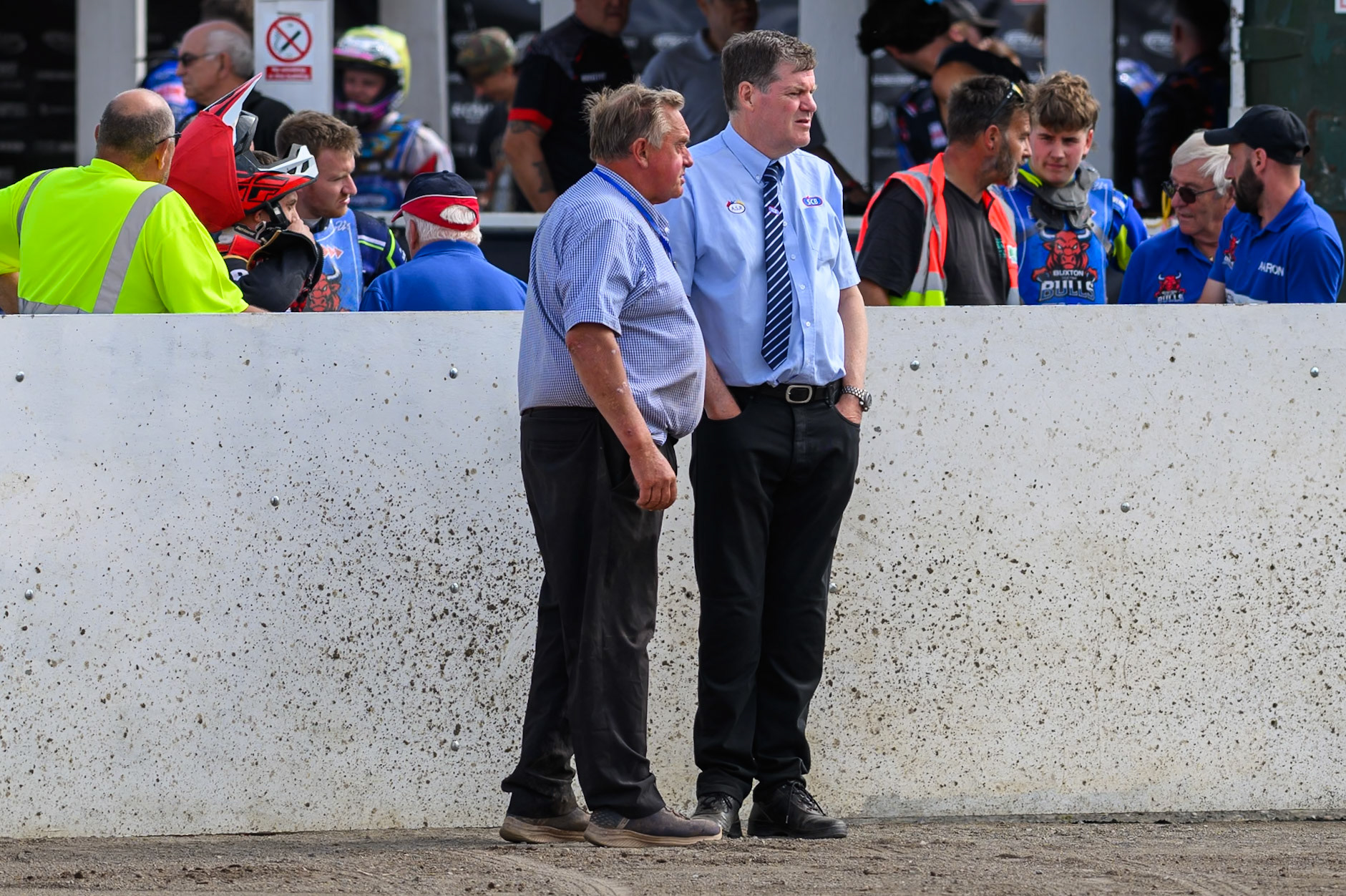 Referee Michael Breckon (Right)  discusses the track with Track Curator Graham Trollope during the WSRA National Development League match between Buxton Bulls and King's Lynn Young Stars at Hi-Edge Speedway, Buxton on Sunday 9th August 2026. (Photo: Ian Charles | MI News)