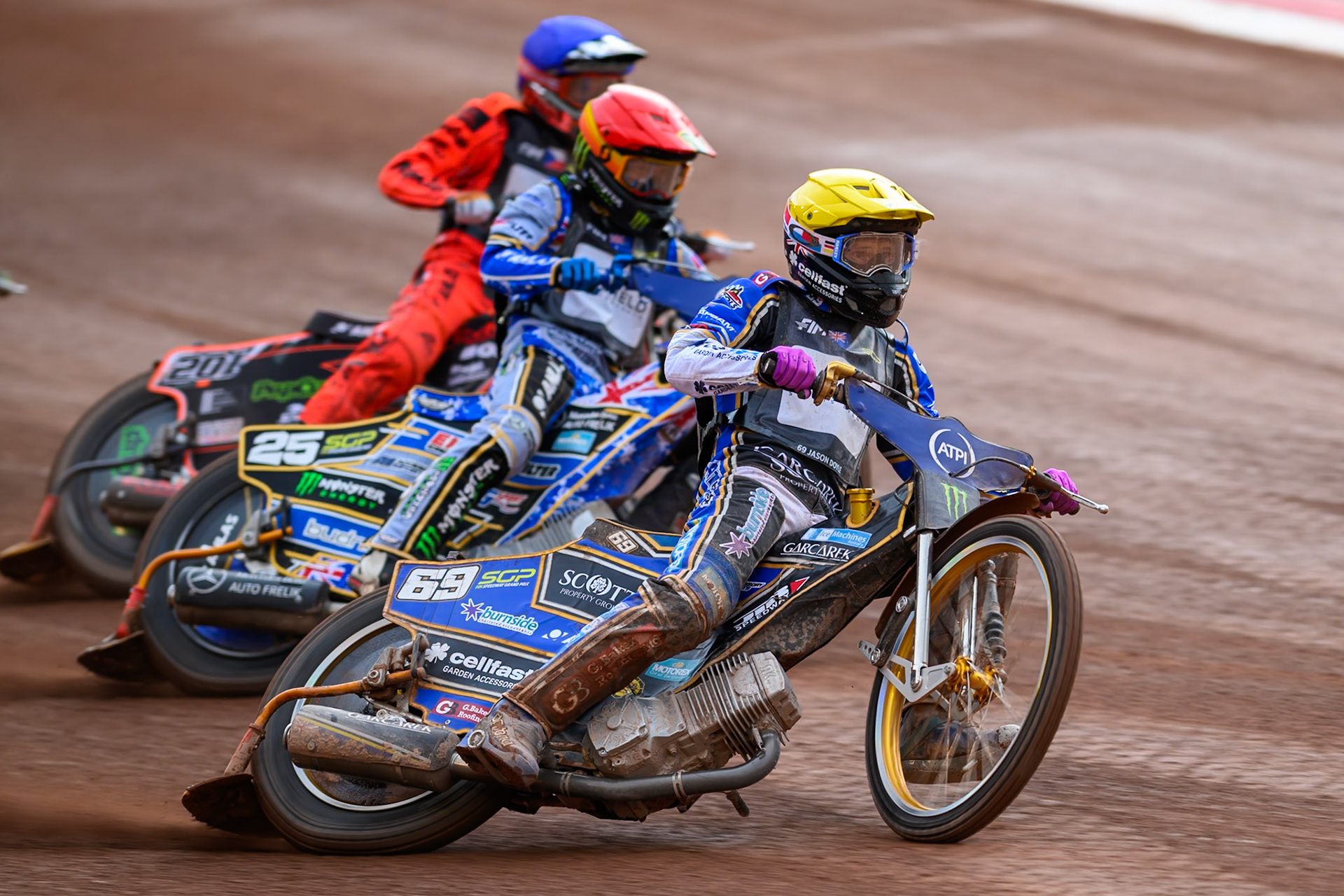 Jason Doyle (69) of Australia in Yellow leading Jack Holder (25) of Australia in Red and Jan Kvech (201) of Czech Republic in Blue during the ATPI  FIM Speedway GP of Manchester at the National Speedway Stadium, Manchester on Saturday 6th June 2026. (Photo: Ian Charles | MI News)