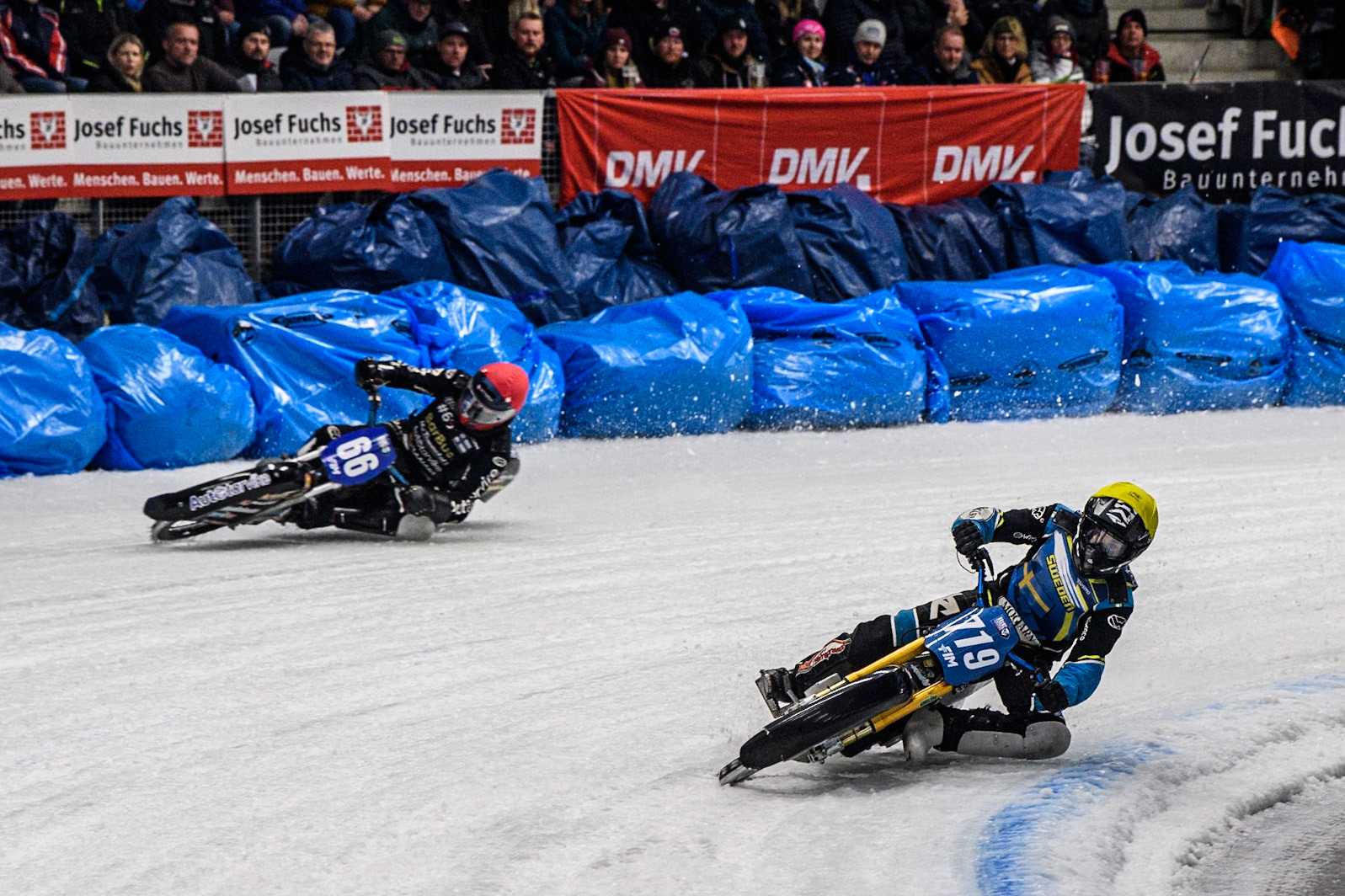 Filip Jäger (719) of Sweden in Yellow rides inside Aki Ala-Riihimäki (66) of Finland in Red during the Ice Speedway Gladiators World Championship Final 2 at Max-Aicher-Arena, Inzell on Sunday 16th March 2025. (Photo: Ian Charles | MI News)