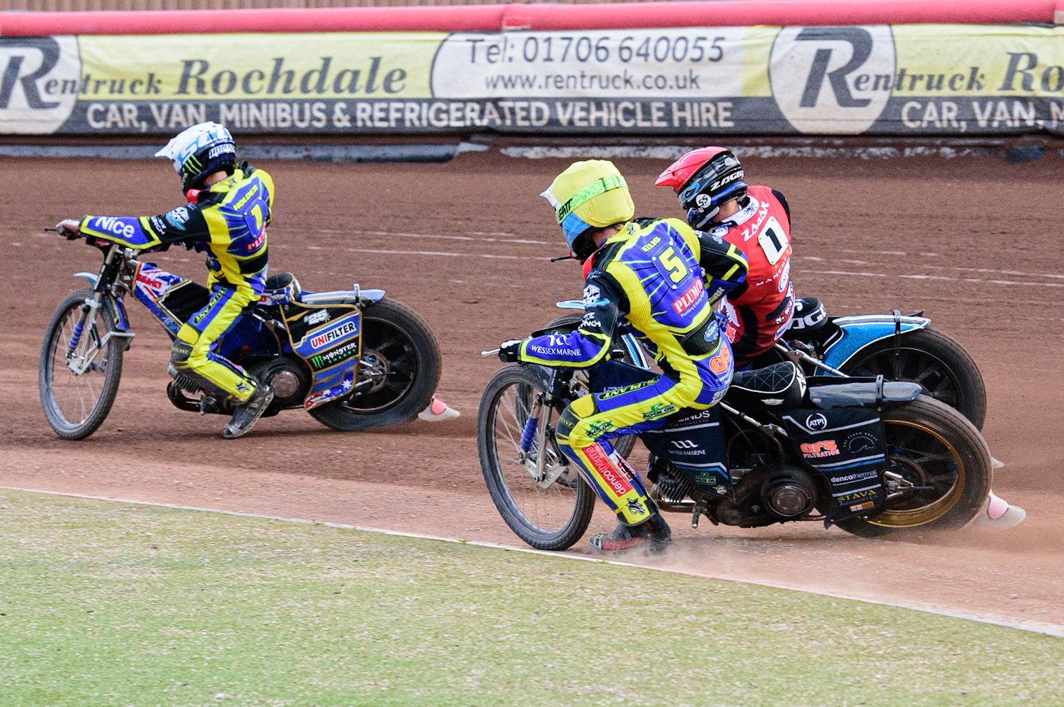 MANCHESTER, UK. JUL 5TH  Jack Holder  (White) leads Matej Zagar  (Red) and Adam Ellis  (Yellow)  during the SGB Premiership match between Belle Vue Aces and Sheffield Tigers at the National Speedway Stadium, Manchester on Tuesday 5th July 2022. (Credit: Ian Charles | MI News)