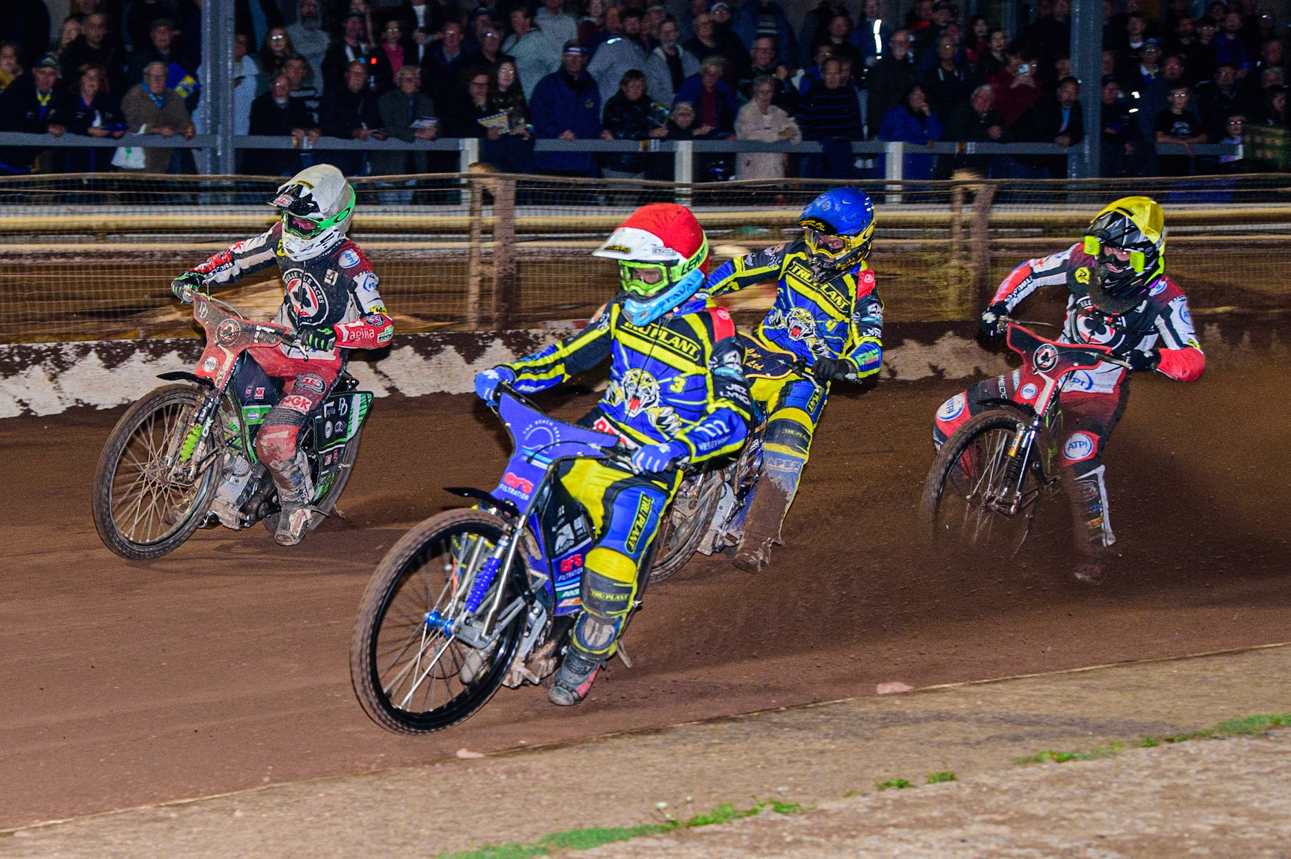 Adam Ellis  (Red) leads Kyle Howarth  (Blue) Charles Wright  (White) and Tom Brennan  (Yellow) during the SGB Premiership match between Sheffield Tigers and Belle Vue Aces at Owlerton Stadium, Sheffield on Thursday 22nd September 2022. (Credit: Ian Charles | MI News)