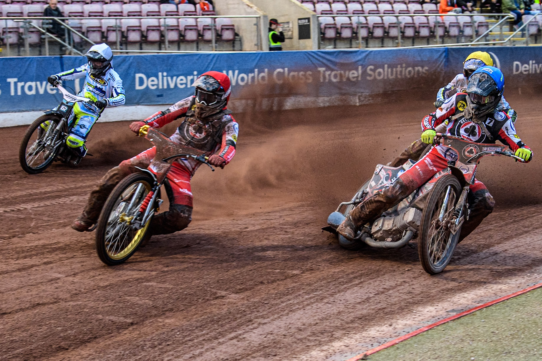 Belle Vue Aces' Norick Blodorn in Red leading Belle Vue Aces' Connor Bailey in Blue Oxford Spires' Ashton Boughen in Yellow and Oxford Spires' Erik Riss in White during the Rowe Motor Oil Premiership match between Belle Vue Aces and Oxford Spires at the National Speedway Stadium, Manchester on Monday 13th May 2024. (Photo: Ian Charles | MI News)