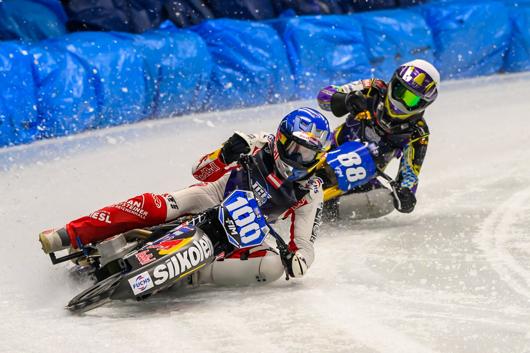 Franz Zorn (100) of Austria  in Blue leading Max Niedermaier (88) of Germany  in White during the Ice Speedway Gladiators World Championship Final 1 at Max-Aicher-Arena, Inzell on Saturday 14th March 2026. (Photo: Ian Charles | MI News)
