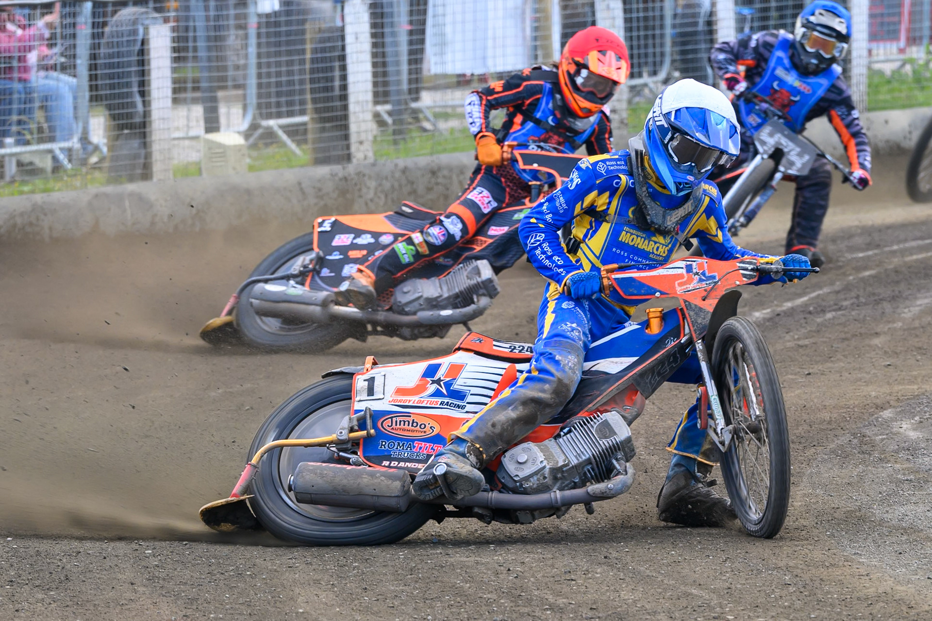 Jordy Loftus of Edinburgh Monarchs Academy in White leading Jack Smith of Buxton Bulls  in Red and Jack Roberts of Buxton Bulls during the WSRA National Development League match between Buxton Bulls and Edinburgh Monarchs Academy at Hi-Edge Speedway, Buxton on Sunday 14th June 2026. (Photo: Ian Charles | MI News)