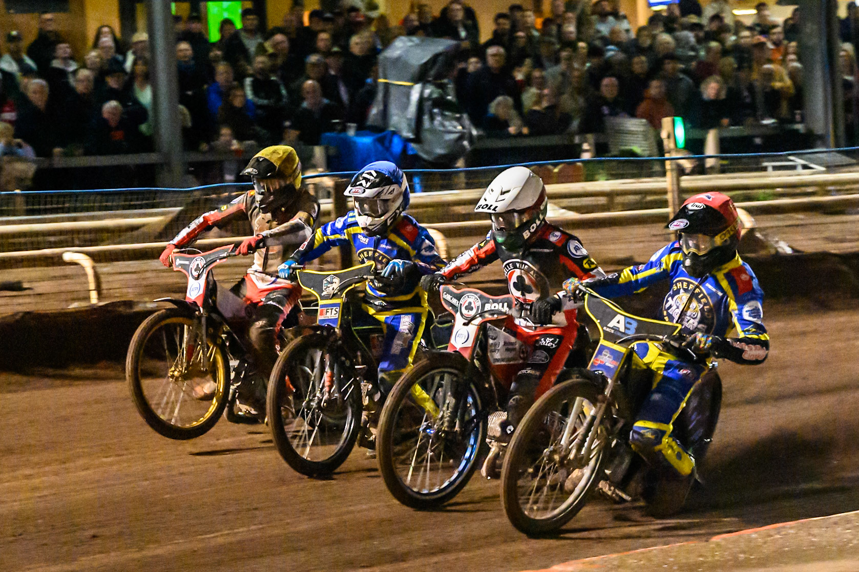 Josh Pickering of Sheffield Tigers in Red on the inside of Brady Kurtz of Belle Vue Aces in White , Jye Etheridge of Sheffield Tigers in Blue and Norick Blodorn of Belle Vue Aces in Yellow during the Rowe Motor Oil Premiership Grand Final 1st Leg match between Sheffield Tigers and Belle Vue Aces at Owlerton Stadium, Sheffield on Monday 12th October 2026. (Photo: Ian Charles | MI News)