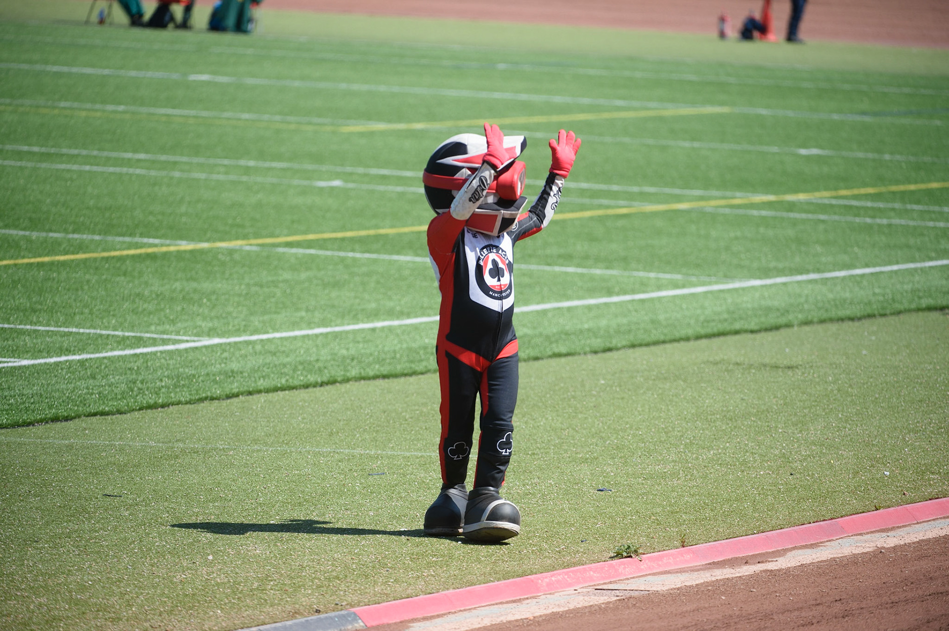 MANCHESTER, UK. MAY 31ST  Belle Vue BikeRight Aces  Mascot Chase The Ace waves to the fans on the back straight during the SGB Premiership match between Belle Vue Aces and Peterborough at the National Speedway Stadium, Manchester on Monday 31st May 2021. (Credit: Ian Charles | MI News)