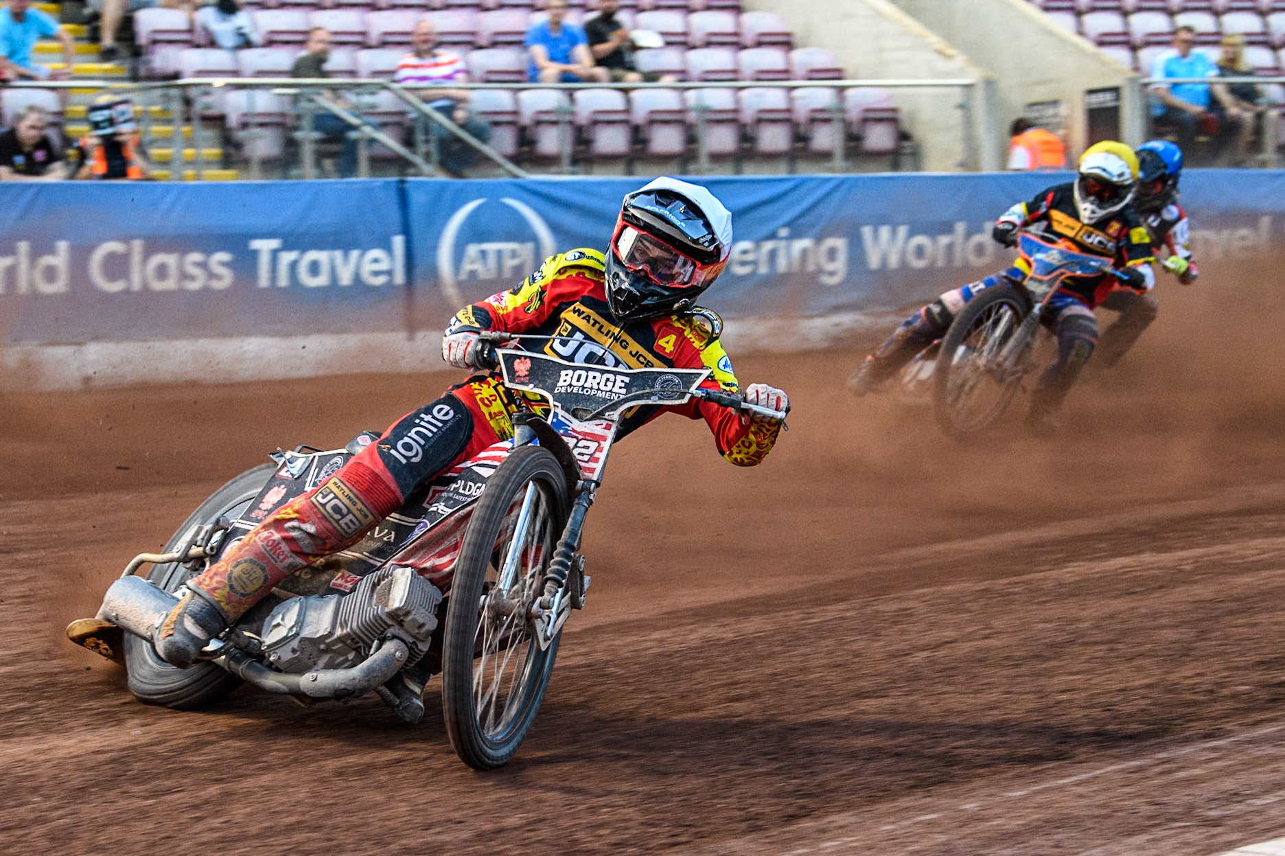Leicester Lions' Luke Becker in White leading Leicester Lions' Guest rider Luke Killeen in Yellow and Belle Vue Aces' Connor Bailey in Blue during the Rowe Motor Oil Premiership match between Belle Vue Aces and Leicester Lions at the National Speedway Stadium, Manchester on Monday 24th June 2024. (Photo: Ian Charles | MI News)