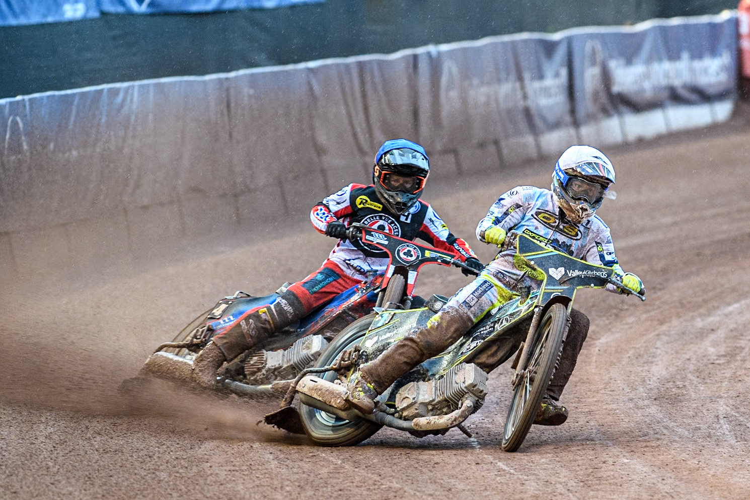 Oxford Spires' Rohan Tungate in White leading Belle Vue Aces' Ben Cook in Blue during the Rowe Motor Oil Premiership match between Belle Vue Aces and Oxford Spires at the National Speedway Stadium, Manchester on Monday 13th May 2024. (Photo: Ian Charles | MI News)