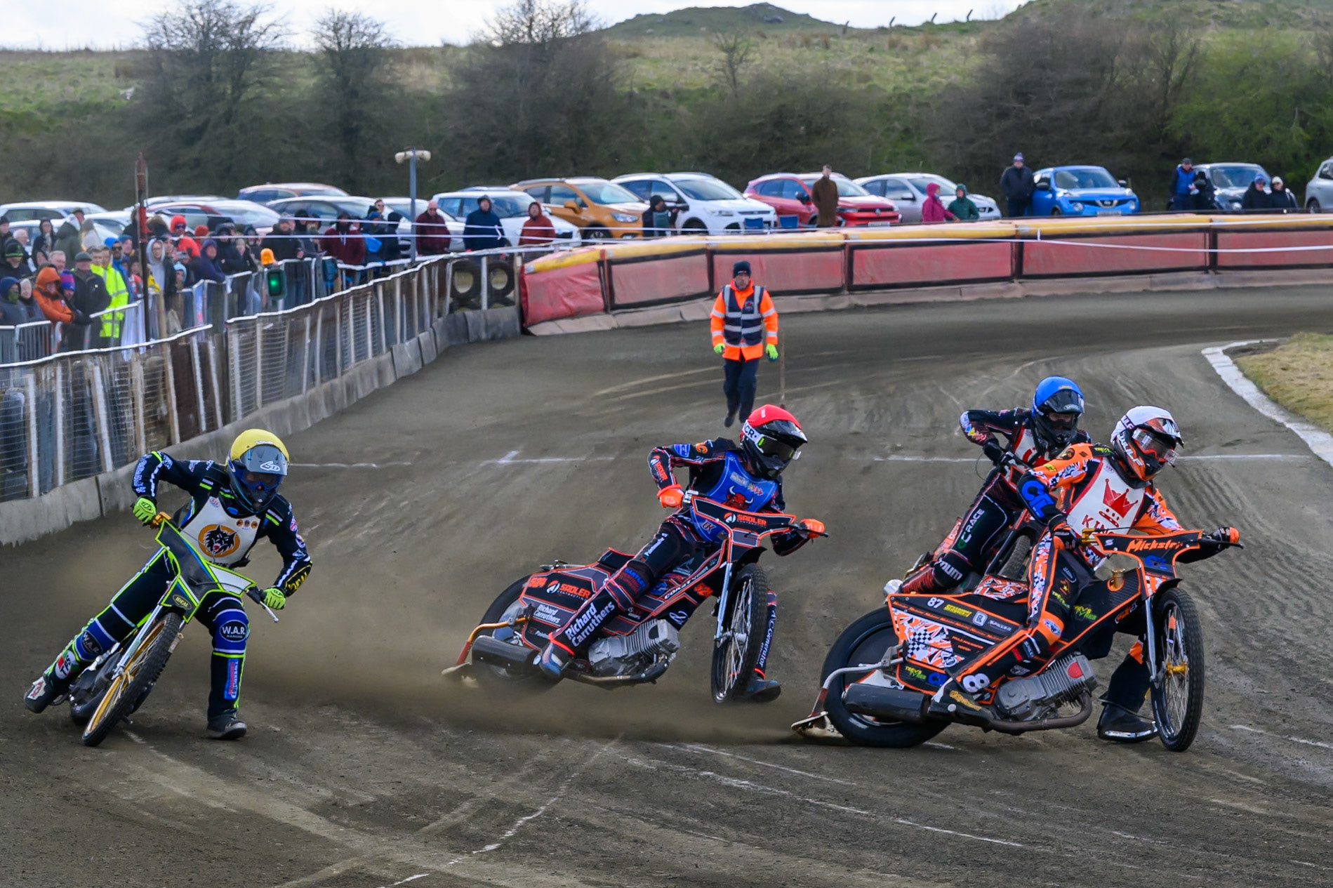 Mickie Simpson of 'The Kings'  in White rides inside Kieran Douglas of 'The Wolves' in Yellow with Jacob Fellows of Buxton Bulls  in Red and Harrison Rogers of 'The Potters' behind during the Regina Chains Fours at Buxton Speedway, Buxton on Sunday 5th April 2026. (Photo: Ian Charles | MI News)