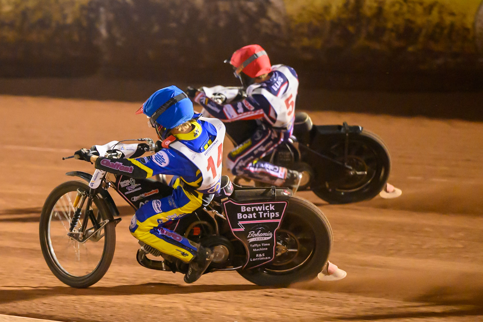 Leon Flint (14) in Blue rides inside Adam Ellis (5) in Red during the Cab Direct British Speedway Championship Final at the National Speedway Stadium, Manchester on Saturday 15th August 2026. (Photo: Ian Charles | MI News)