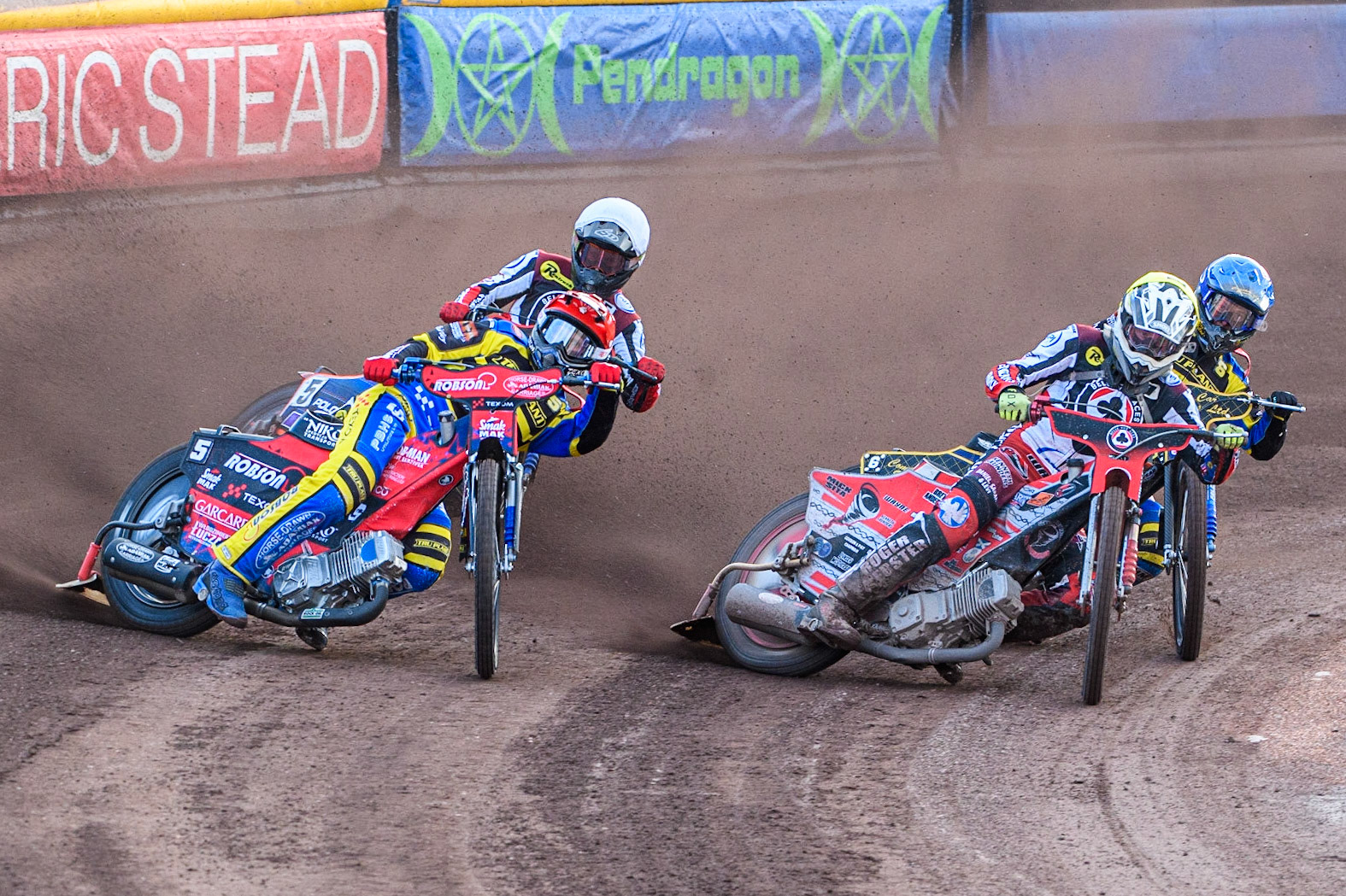 Connor Bailey (Yellow) inside Tobiasz Musielak (Red) with Kyle Howarth (Blue) and Brady Kurtz (White) behind during the Sports Insure Premiership match between Sheffield Tigers and Belle Vue Aces at Owlerton Stadium, Sheffield on Thursday 20th July 2023. (Photo: Ian Charles | MI News)