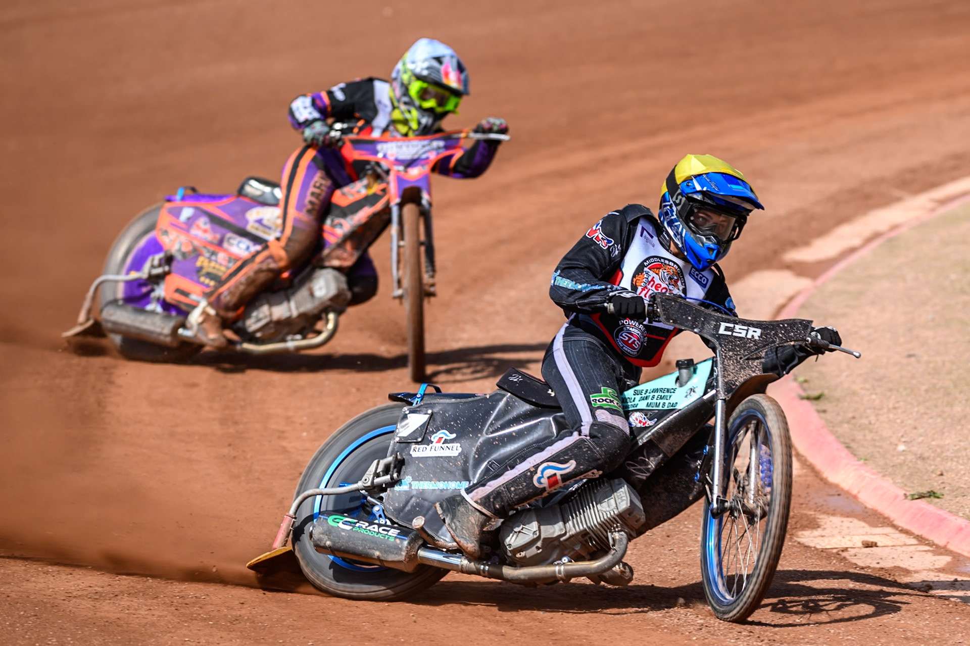 Charlie Southwick of Middlesborough Tigers in Yellow leading team mate Elliot Kelly in White during the WSRA National Development League match between Belle Vue Colts and Middlesbrough Tigers at the National Speedway Stadium, Manchester on Sunday 10th August 2025. (Photo: Mark Fletcher | MI News)