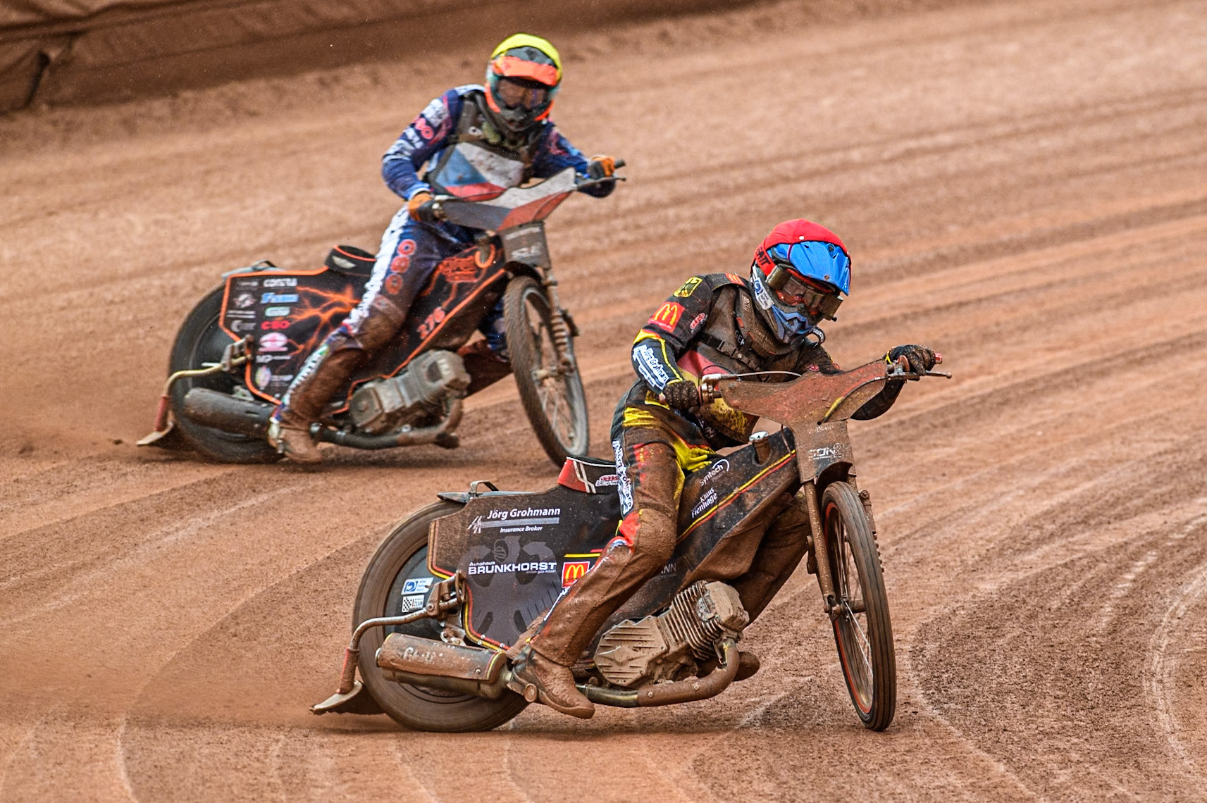 Patrick Hyjek of Germany in Red leading Matous Kamenik of Czech Republic in Yellow during the Monster Energy FIM Speedway of Nations 2 (Under 21) Final at the National Speedway Stadium, Manchester on Friday 12th July 2024. (Photo: Ian Charles | MI News)