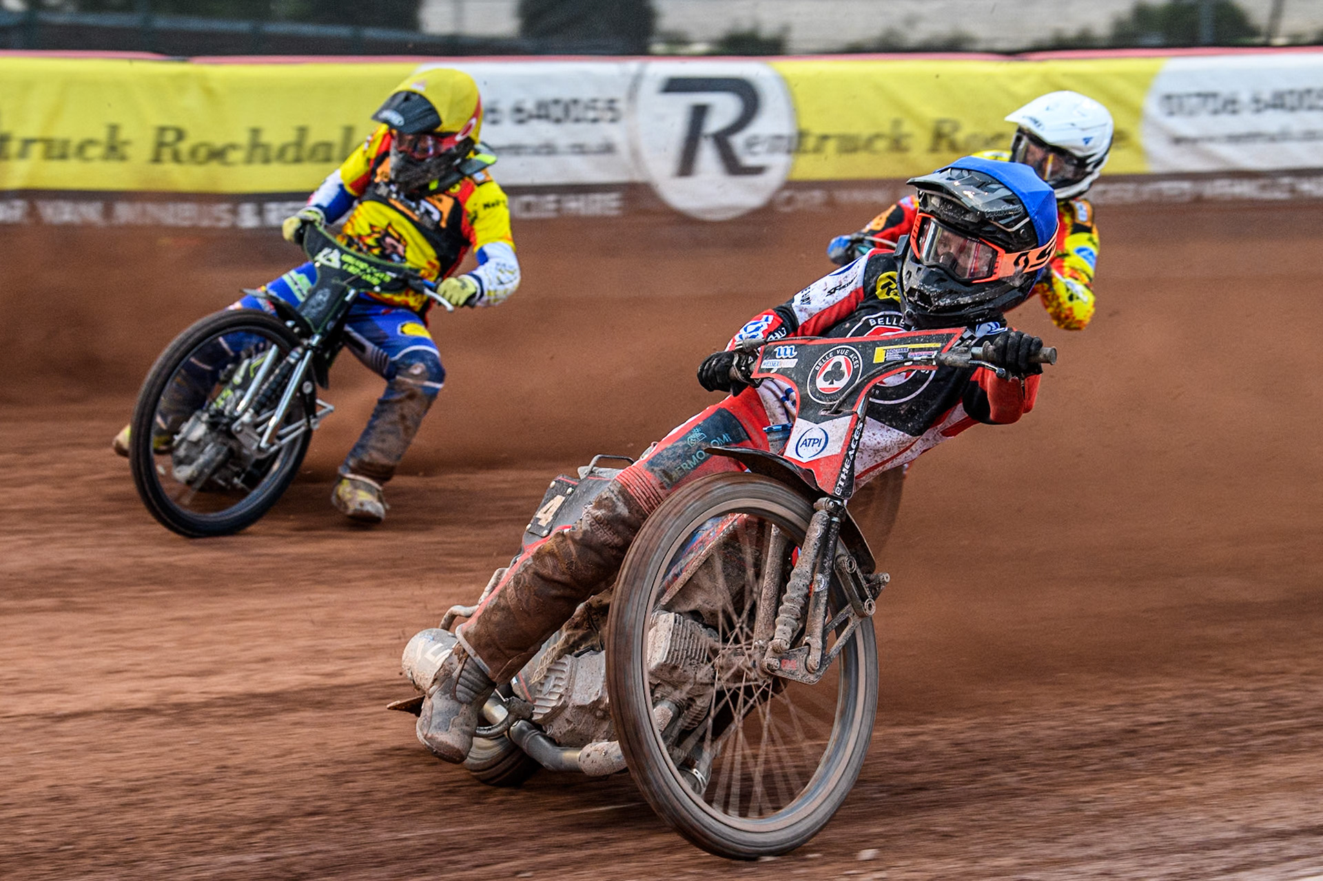 Belle Vue Aces' Ben Cook in Blue leading Leicester Lions' Craig Cook in Yellow and Leicester Lions' Ryan Douglas in White during the Rowe Motor Oil Premiership match between Belle Vue Aces and Leicester Lions at the National Speedway Stadium, Manchester on Monday 24th June 2024. (Photo: Ian Charles | MI News)