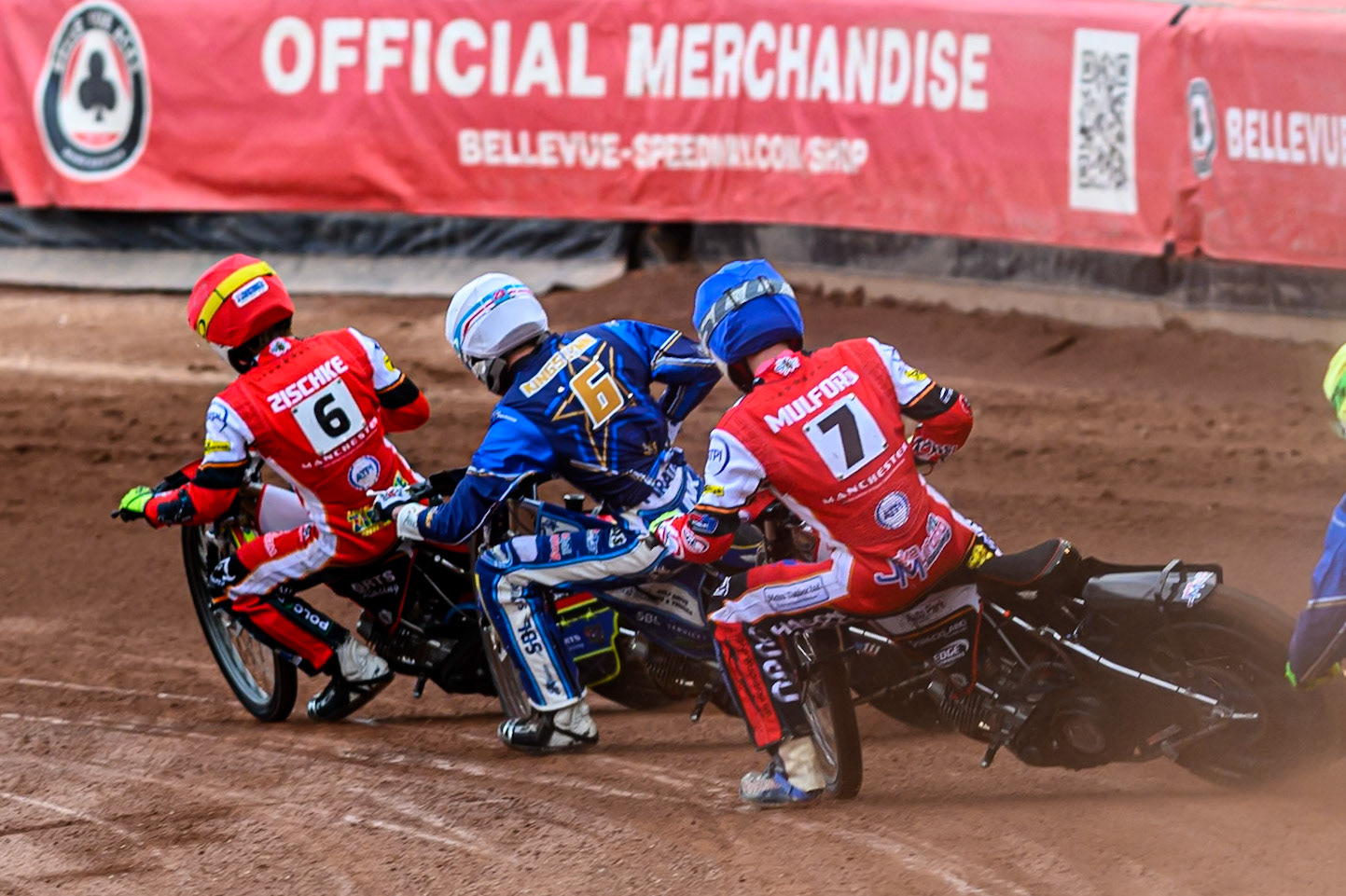 Belle Vue Aces' Jake Mulford in Blue chases Kings Lynn Stars' Guest Rider, Anders Rowe in White and Belle Vue Aces' Tate Zischke in Red during the Rowe Motor Oil Premiership match between Belle Vue Aces and King's Lynn Stars at the National Speedway Stadium, Manchester on Monday 23rd June 2025. (Photo: Ian Charles | MI News)