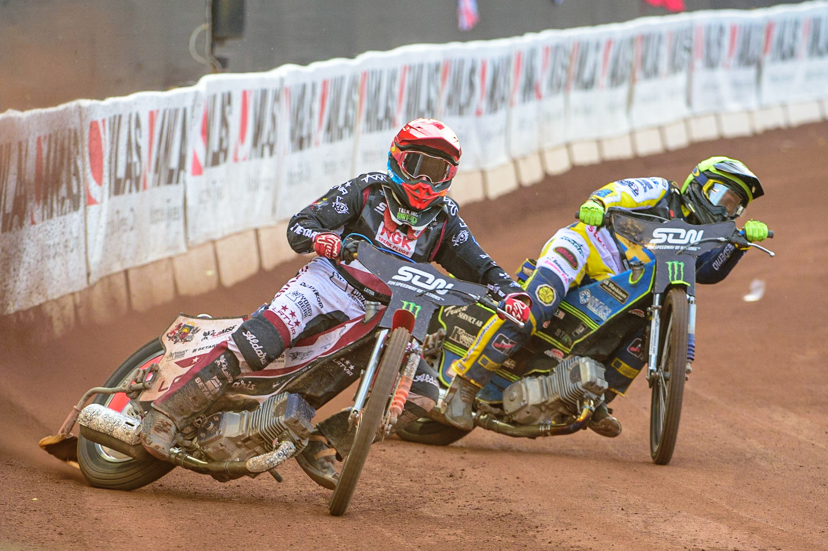MANCHESTER, UK. OCT 16TH Andzejs Lebedevs of Latvia (Red) leads Philip Hellström-Bangs of Sweden (Yellow) during the Monster Energy FIM Speedway of Nations at the National Speedway Stadium, Manchester on Saturday  16th October 2021. (Credit: Ian Charles | MI News)