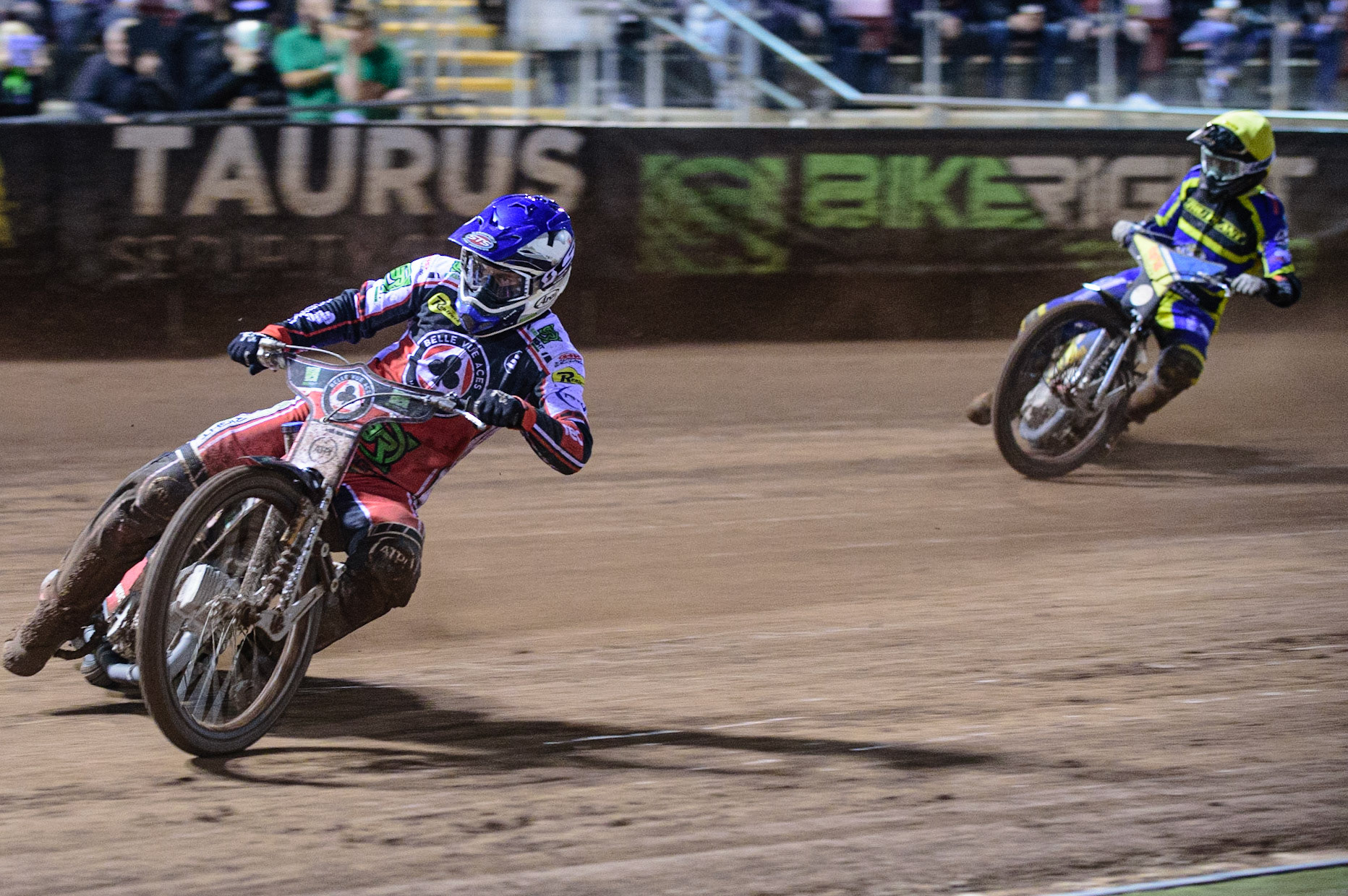 MANCHESTER, UK. OCT 7TH  Richie Worrall  (Blue) leads Adam Ellis  (Yellow) during the SGB Premiership Play off Semi-Final Second Leg between Belle Vue Aces and Sheffield Tigers at the National Speedway Stadium, Manchester on Thursday 7th October 2021. (Credit: Ian Charles | MI News)