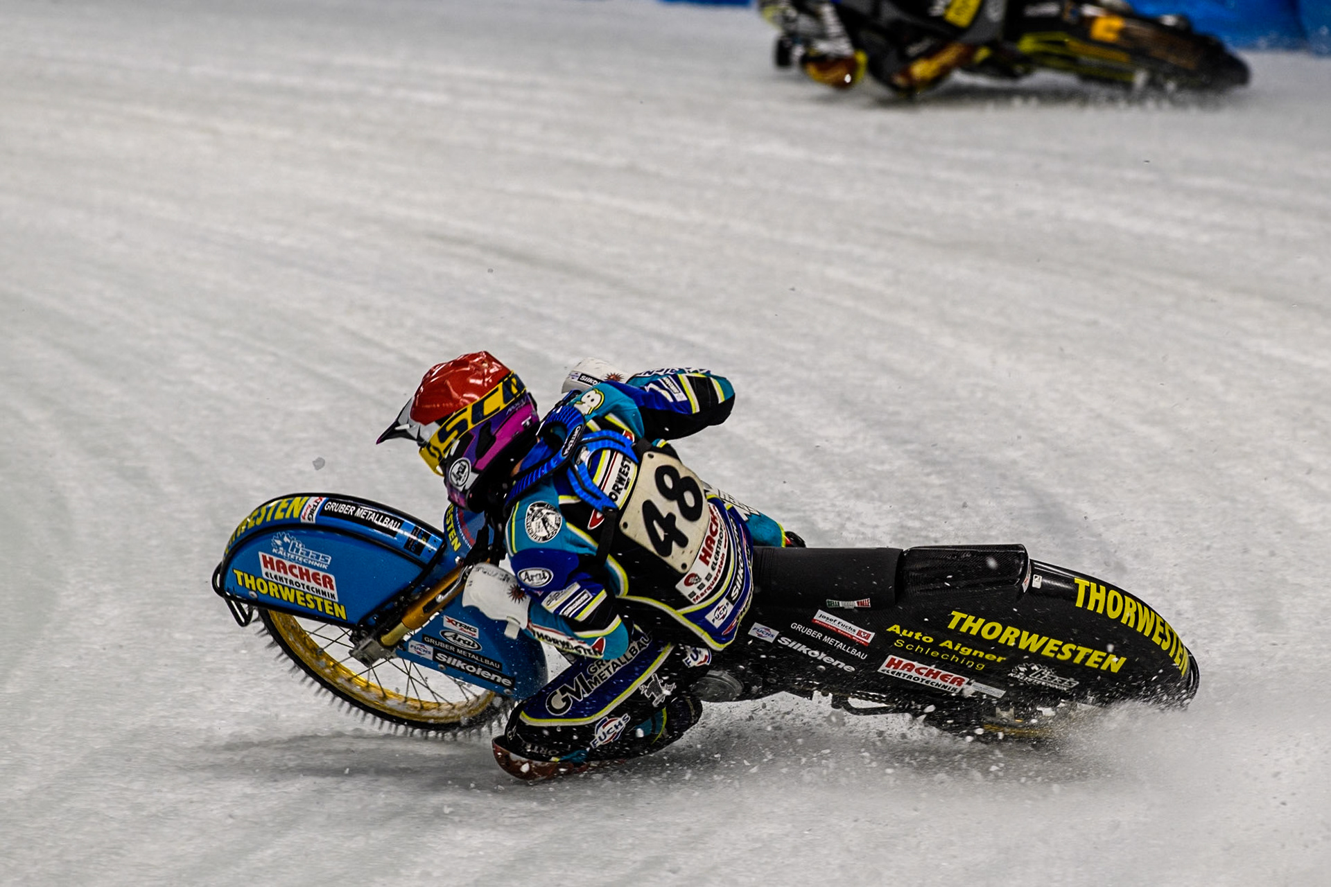 Luca Bauer (48) of Germany spins and leaves the track during the Ice Speedway Gladiators World Championship Final 1 at Max-Aicher-Arena, Inzell on Saturday 15th March 2025. (Photo: Ian Charles | MI News)