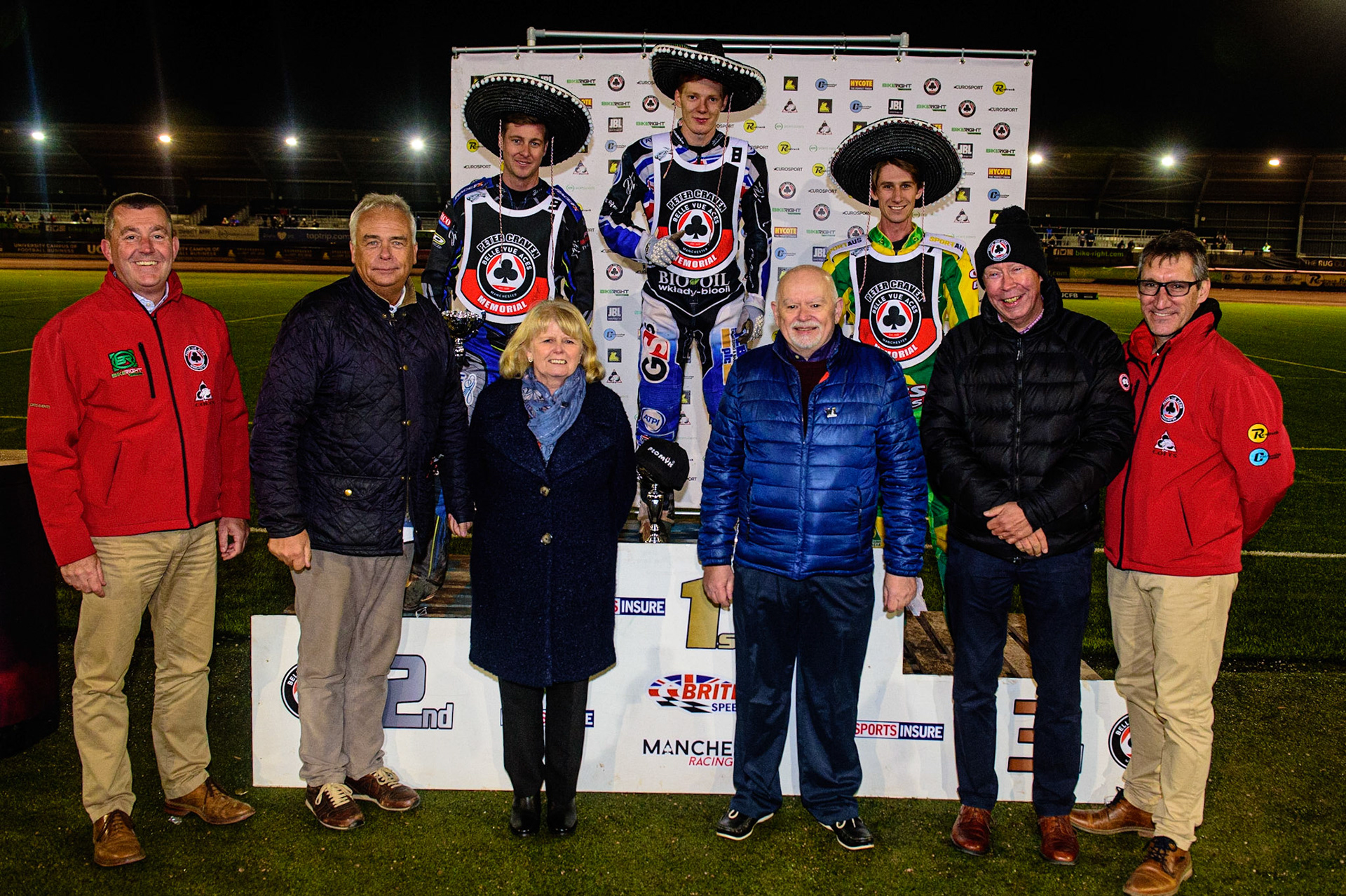 MANCHESTER, UK. OCT 23RD  Rear: (l-r) Ryan Douglas , Dan Bewley , Max Fricke. Front(l-r) Adrian Smith (CEO Belle Vue), Robin Southwell (Belle Vue Owner), Lynn Craven, Robert Craven, Tony Rice (Owner), Mark Lemon (Director Of Speedway - Belle Vue) during the Peter Craven Memorial Trophy event at the National Speedway Stadium, Manchester on Saturday 23rd October 2021. (Credit: Ian Charles | MI News)