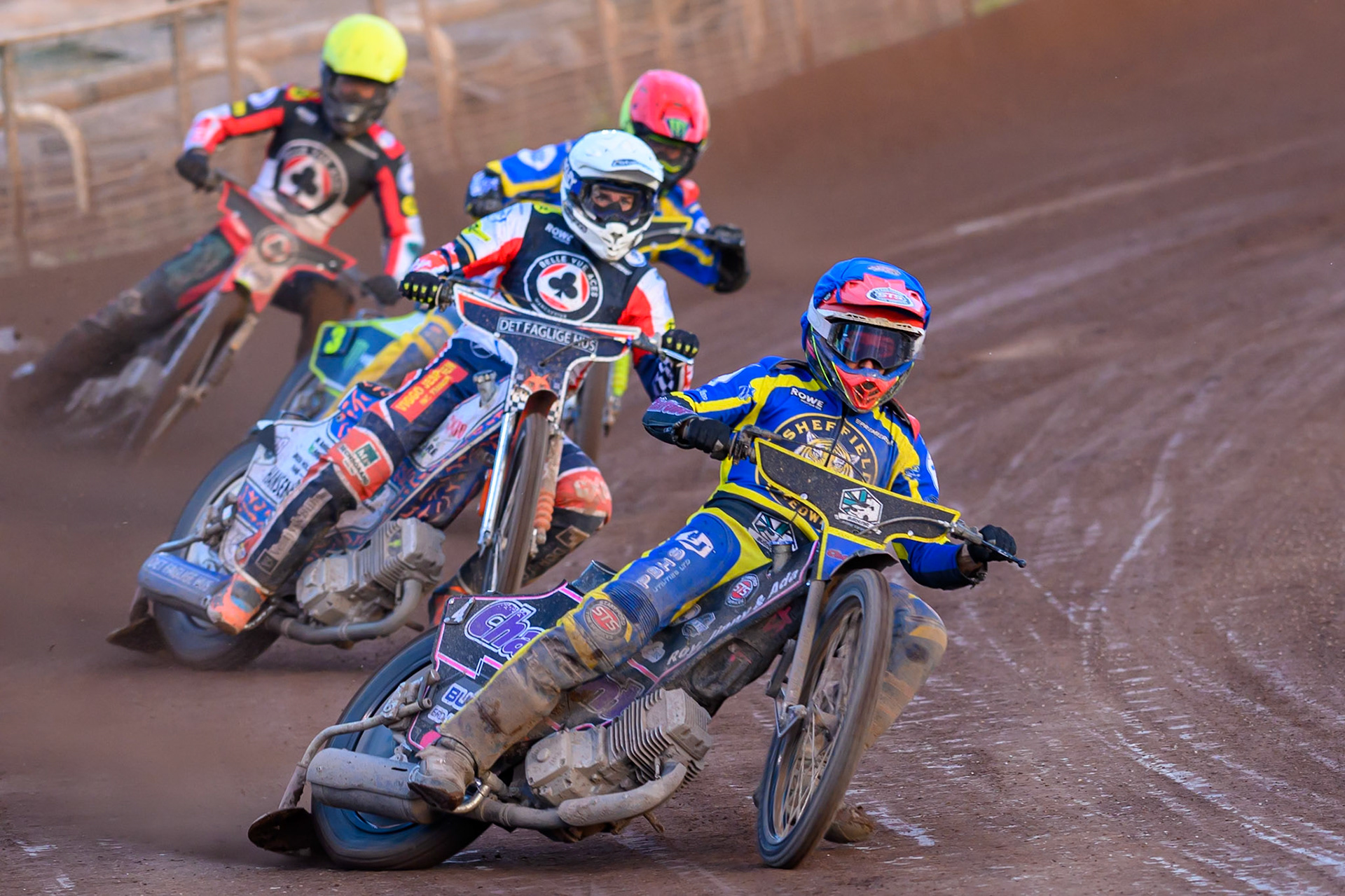 Leon Flint of Sheffield Tigers in Blue leading Niels-Kristian Iversen, Guest Rider for Belle Vue Aces in White, Chris Holder of Sheffield Tigers in Red and Tate Zischke of Belle Vue Aces in Yellow during the Rowe Motor Oil Premiership match between Sheffield Tigers and Belle Vue Aces at Owlerton Stadium, Sheffield on Monday 25th May 2026. (Photo: Ian Charles | MI News)