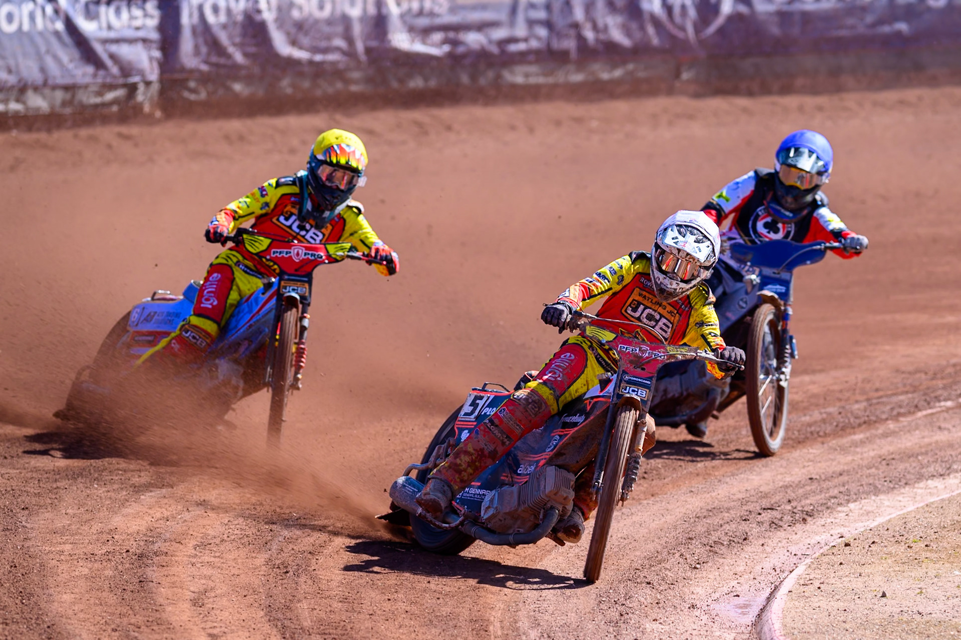 Sam Masters of Leicester Lions  and Drew Kemp of Leicester Lions   in Yellow leading Jonas Jeppesen Guest Rider for Belle Vue Aces in Blue during the Knockout Cup Northern Section match between Belle Vue Aces and Leicester Lions at the National Speedway Stadium, Manchester on Monday 6th April 2026. (Photo: Ian Charles | MI News)