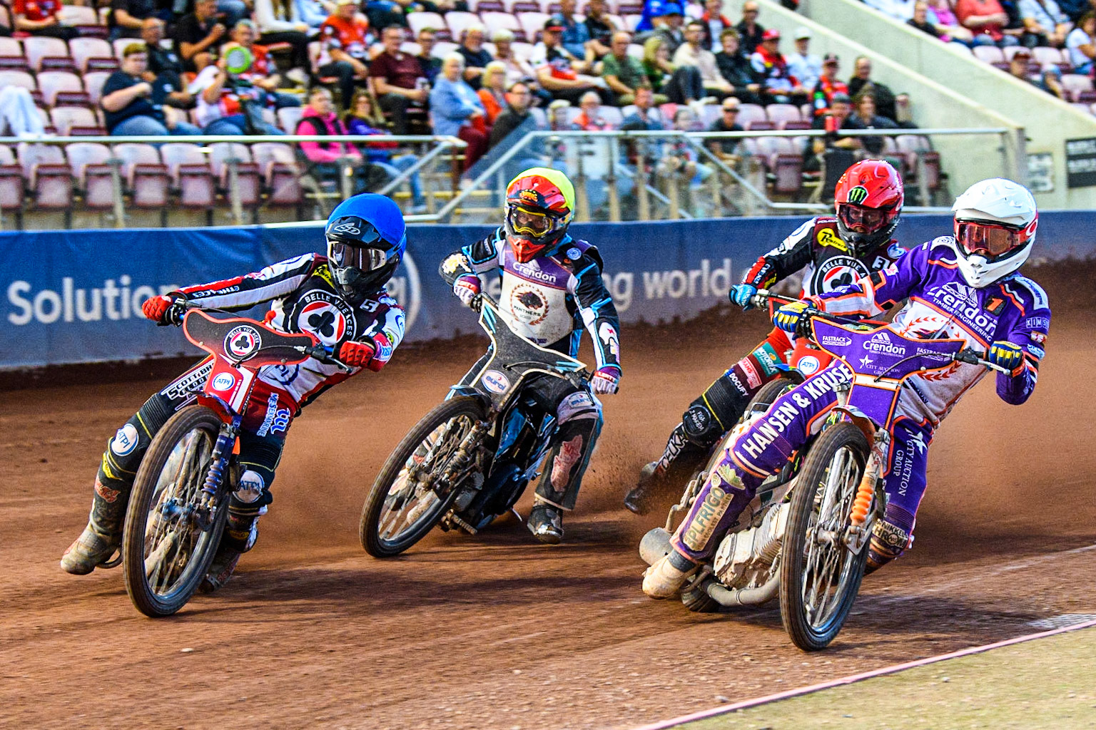 Niels-Kristian Iversen  (White) inside Brady Kurtz (Blue) with Jaimon Lidsey (Red) and Vadim Tarasenko (Yellow) behind during the Sports Insure Premiership match between Belle Vue Aces and Peterborough at the National Speedway Stadium, Manchester on Monday 19th June 2023. (Photo: Ian Charles | MI News)