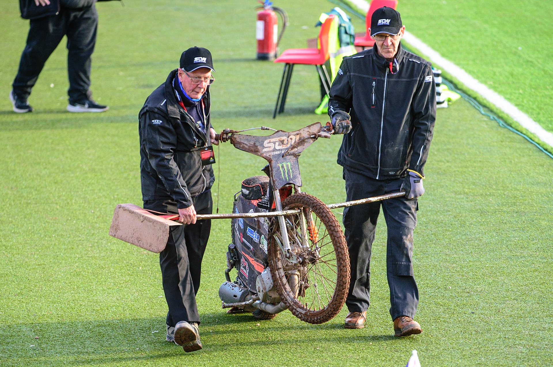 MANCHESTER, UK. OCT 16TH Track Staff carry off Jacob Thorsell’s bike after his fall during the Monster Energy FIM Speedway of Nations at the National Speedway Stadium, Manchester on Saturday  16th October 2021. (Credit: Ian Charles | MI News)