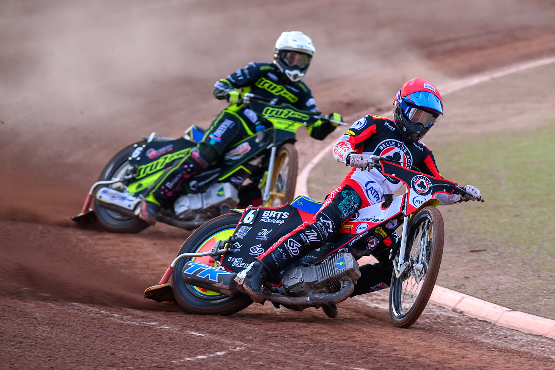 Tate Zischke of Belle Vue Aces  in Red leading Philip Hellstrom-Bangs of Ipswich Witches  in White during the Rowe Motor Oil Premiership match between Belle Vue Aces and Ipswich Witches at the National Speedway Stadium, Manchester on Monday 20th April 2026. (Photo: Ian Charles | MI News)
