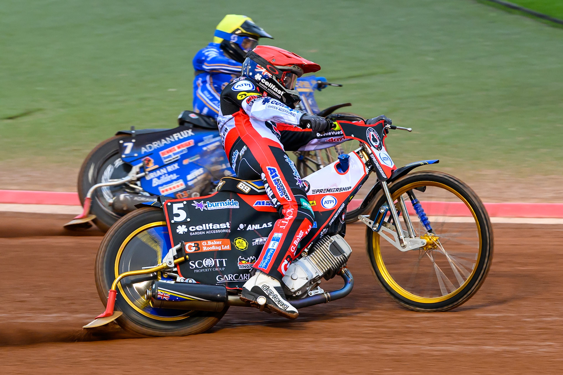 Jason Doyle of Belle Vue Aces in Red rides outside Jody Scott of Kings Lynn Stars in Yellow during the Rowe Motor Oil Premiership match between Belle Vue Aces and King's Lynn Stars at the National Speedway Stadium, Manchester on Monday 29th June 2026. (Photo: Ian Charles | MI News)