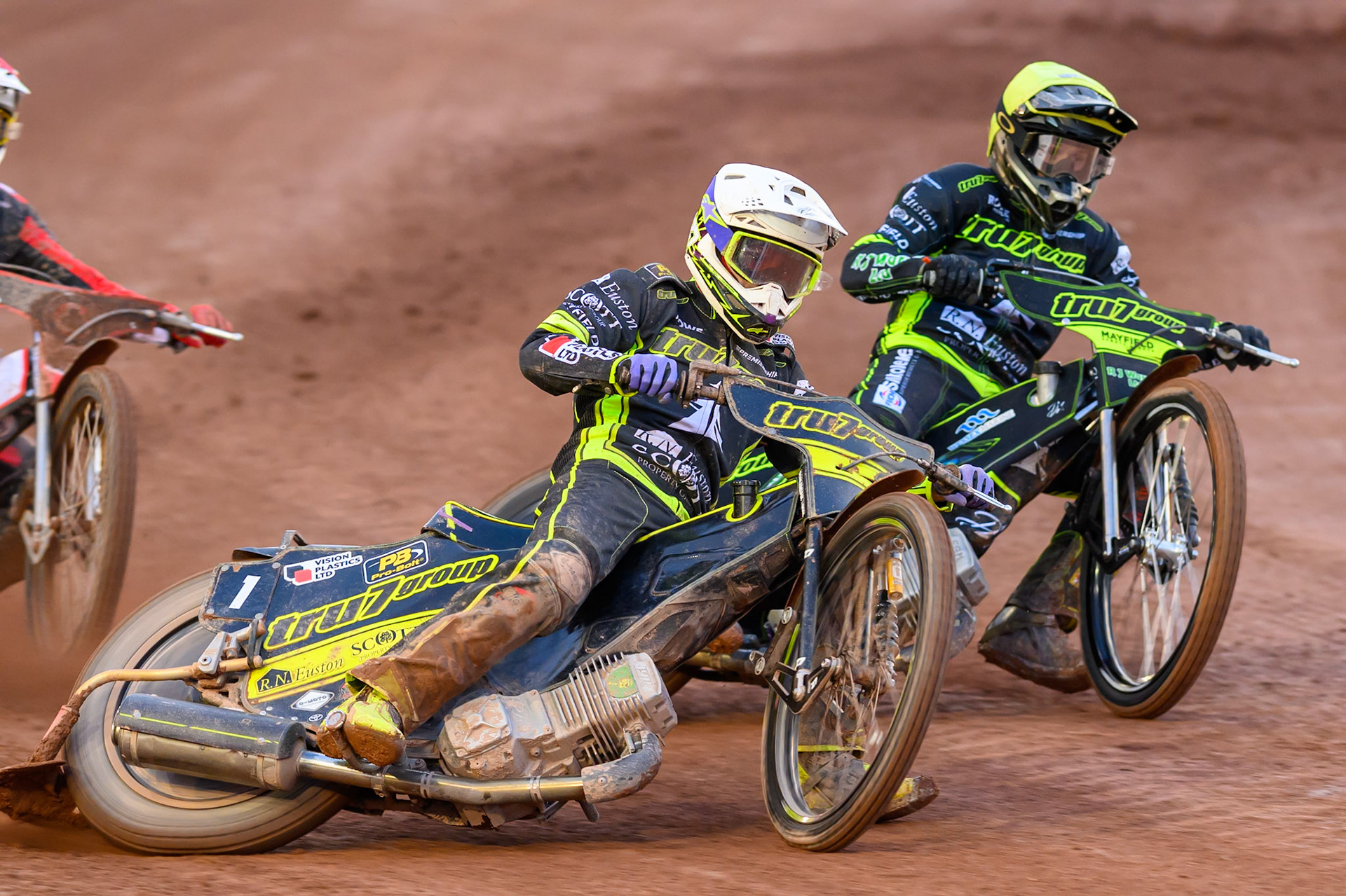 Tom Brennan of Ipswich Witches  in White rides outside Danny King of Ipswich Witches  in Yellow during the Rowe Motor Oil Premiership match between Belle Vue Aces and Ipswich Witches at the National Speedway Stadium, Manchester on Monday 20th April 2026. (Photo: Ian Charles | MI News)