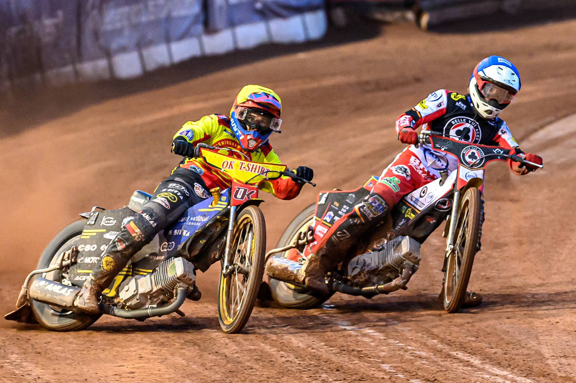 Paco Castagna of Birmingham Brummies  in Yellow rides outside Tate Zischke of Belle Vue Aces  in Blue during the Rowe Motor Oil Premiership match between Belle Vue Aces and Birmingham Brummies at the National Speedway Stadium, Manchester on Monday 18th August 2025. (Photo: Ian Charles | MI News)