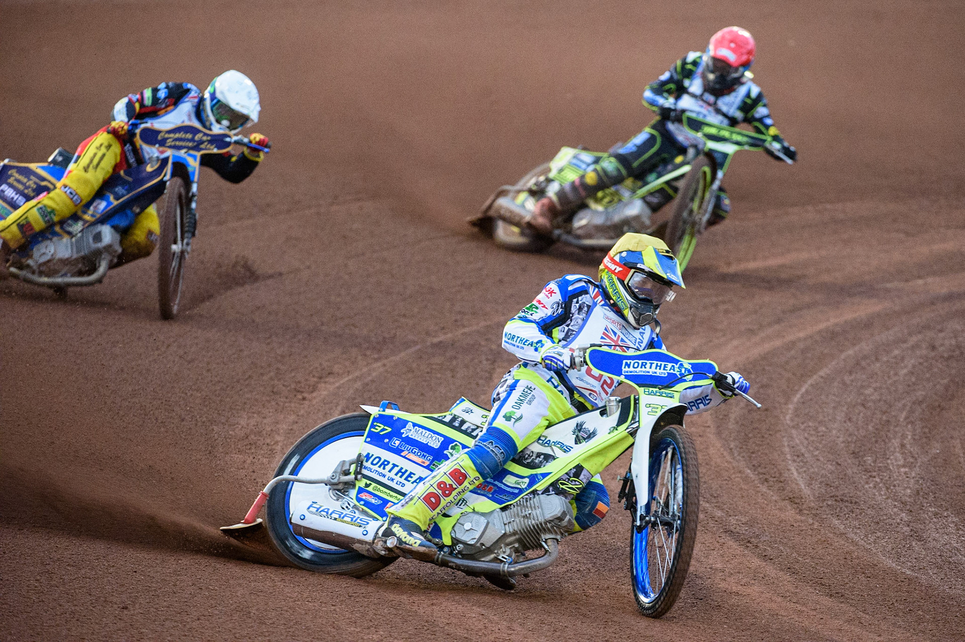 MANCHESTER, UK. AUGUST 16TH   Chris Harris  (Yellow) leads Kyle Howarth  (White) and Craig Cook  (Red) during the Sports Insure British Speedway Finals at the National Speedway Stadium, Manchester on Monday 16th August 2021. (Credit: Ian Charles | MI News)