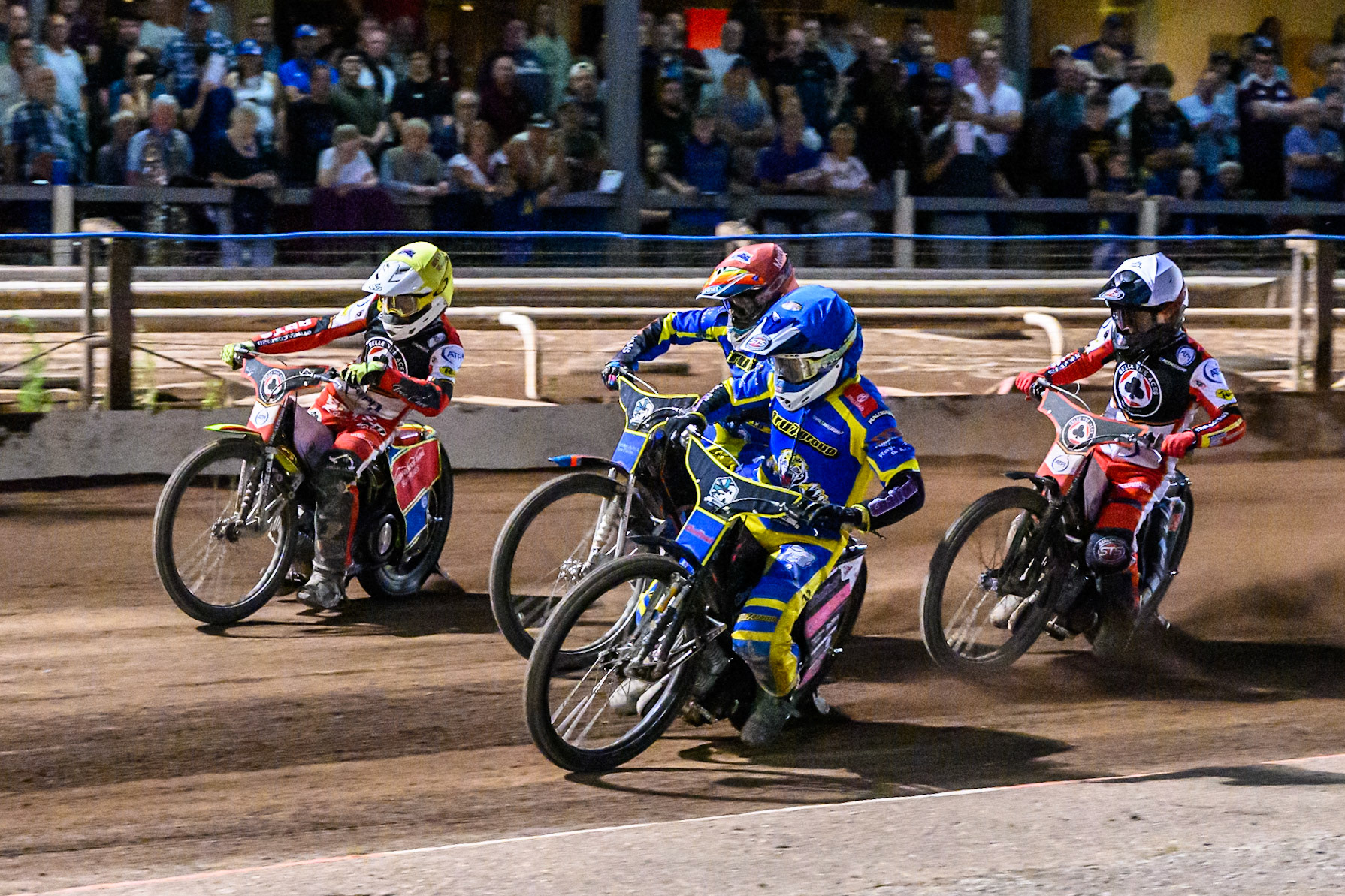 Leon Flint of Sheffield Tigers  in Blue leading Zach Cook of Belle Vue Aces   in White, Nick Morris of Sheffield Tigers  in Red and Tate Zischke of Belle Vue Aces   in Yellow during the Rowe Motor Oil Premiership match between Sheffield Tigers and Belle Vue Aces at Owlerton Stadium, Sheffield on Monday 11th August 2025. (Photo: Ian Charles | MI News)