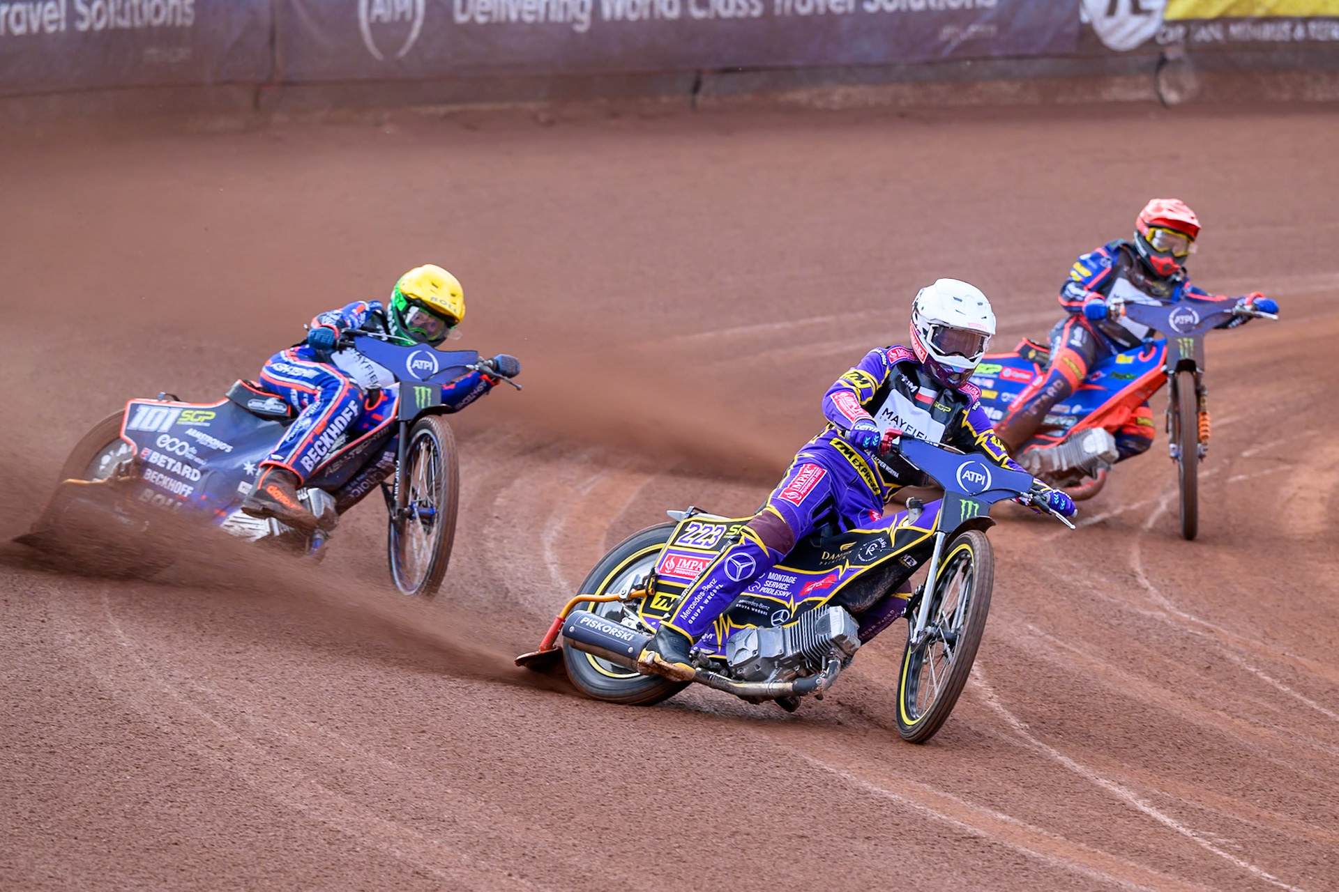Kacper Woryna (223) of Poland in White leading Brady Kurtz (101) of Australia in Yellow and Andzejs Lebedevs (29) of Latvia in Red during the ATPI  FIM Speedway GP of Manchester at the National Speedway Stadium, Manchester on Friday 5th June 2026. (Photo: Ian Charles | MI News)