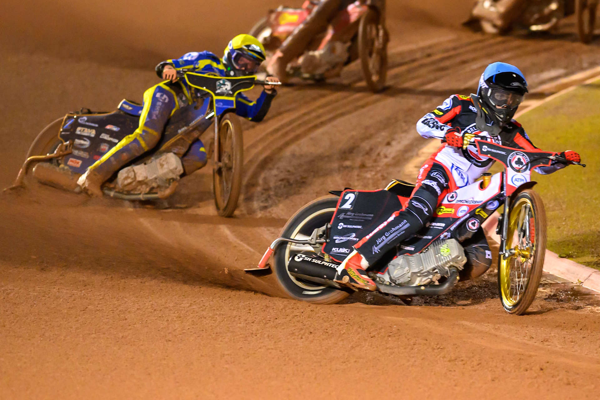 Norick Blodorn of Belle Vue Aces in Blue leading Anders Rowe of Sheffield Tigers in Yellow during the Rowe Motor Oil Premiership Grand Final 2nd Leg between Belle Vue Aces and Sheffield Tigers at the National Speedway Stadium, Manchester on Friday 16th October 2026. (Photo: Ian Charles | MI News)