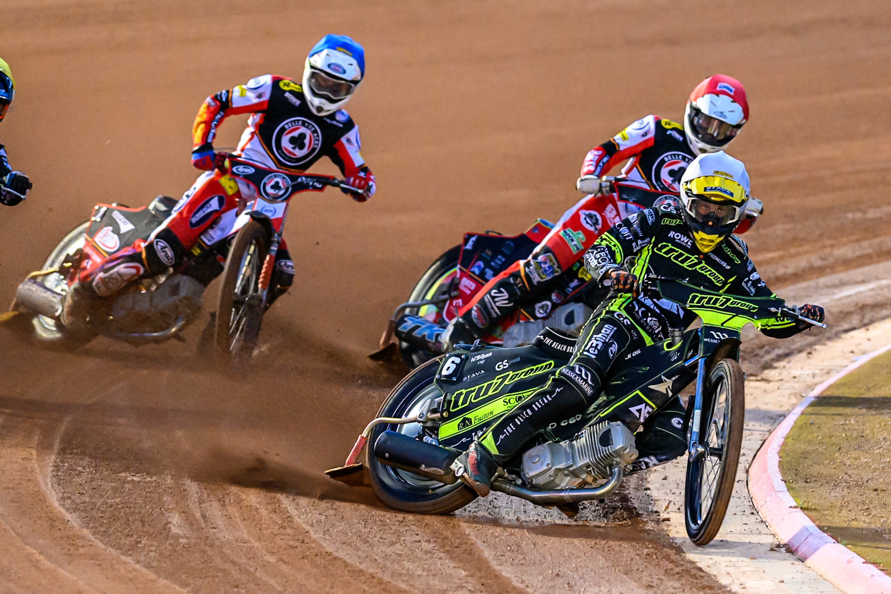 Adam Ellis of Ipswich Witches in White leading Tate Zischke of Belle Vue Aces  in Red and Jake Mulford of Belle Vue Aces  in Blue during the Rowe Motor Oil Premiership Play Off Semi Final 1 (1st Leg)  between Belle Vue Aces and Ipswich Witches at the National Speedway Stadium, Manchester on Monday 8th September 2025. (Photo: Ian Charles | MI News)