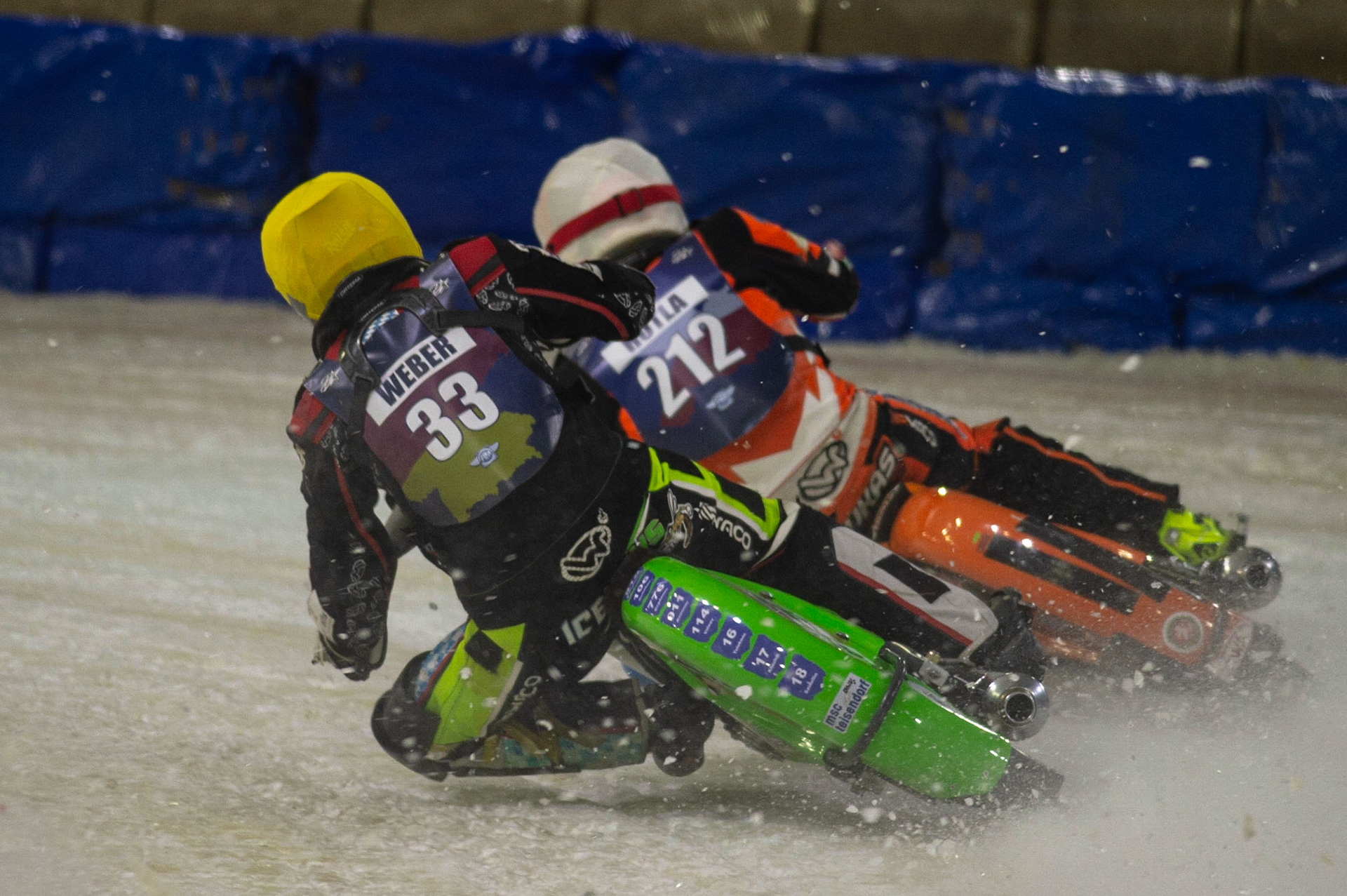 HEERENVEEN, NL.  Johann Weber (33)  (Yellow) chases Lukas Hutla (212) (White) during the FIM Ice Speedway Gladiators World Championship Final 3 at Ice Rink Thialf, Heerenveen on Saturday  2 April 2022. (Credit: Ian Charles | MI News)