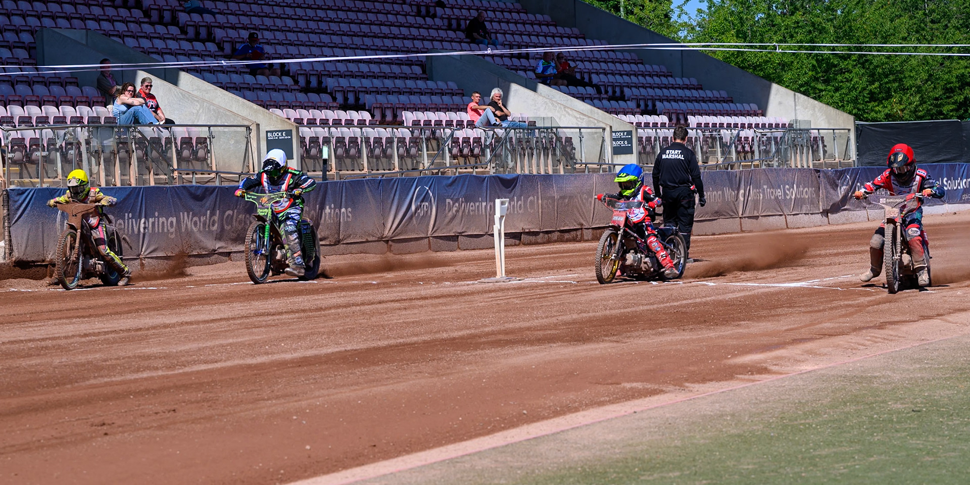 BRITISH YOUTH CHAMPIONSHIP 125cc FINAL (L to R) George Climo (83) in Yellow , Lewis Hague (322) in White, Oscar Berwick (68) in Blue  and Fraser Buckle (555) in Red during the British Youth Championship (125cc) at the National Speedway Stadium, Manchester on Sunday 19th July 2026. (Photo: Ian Charles | MI News)