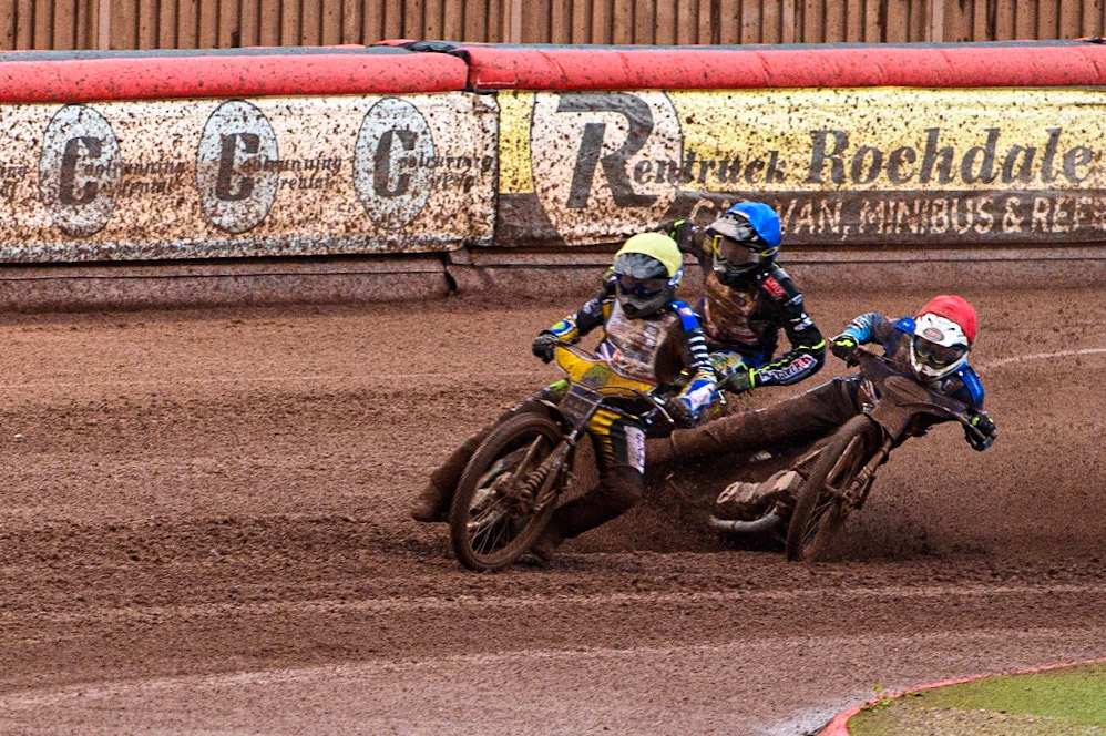 Ben Barker (Yellow) leads as Richard Lawson (Red) and Simon Lambert (Blue) struggle on the heavy track during the Sports Insure British Speedway Final at the National Speedway Stadium, Manchester on Monday 14th August 2023. (Photo: Ian Charles | MI News)