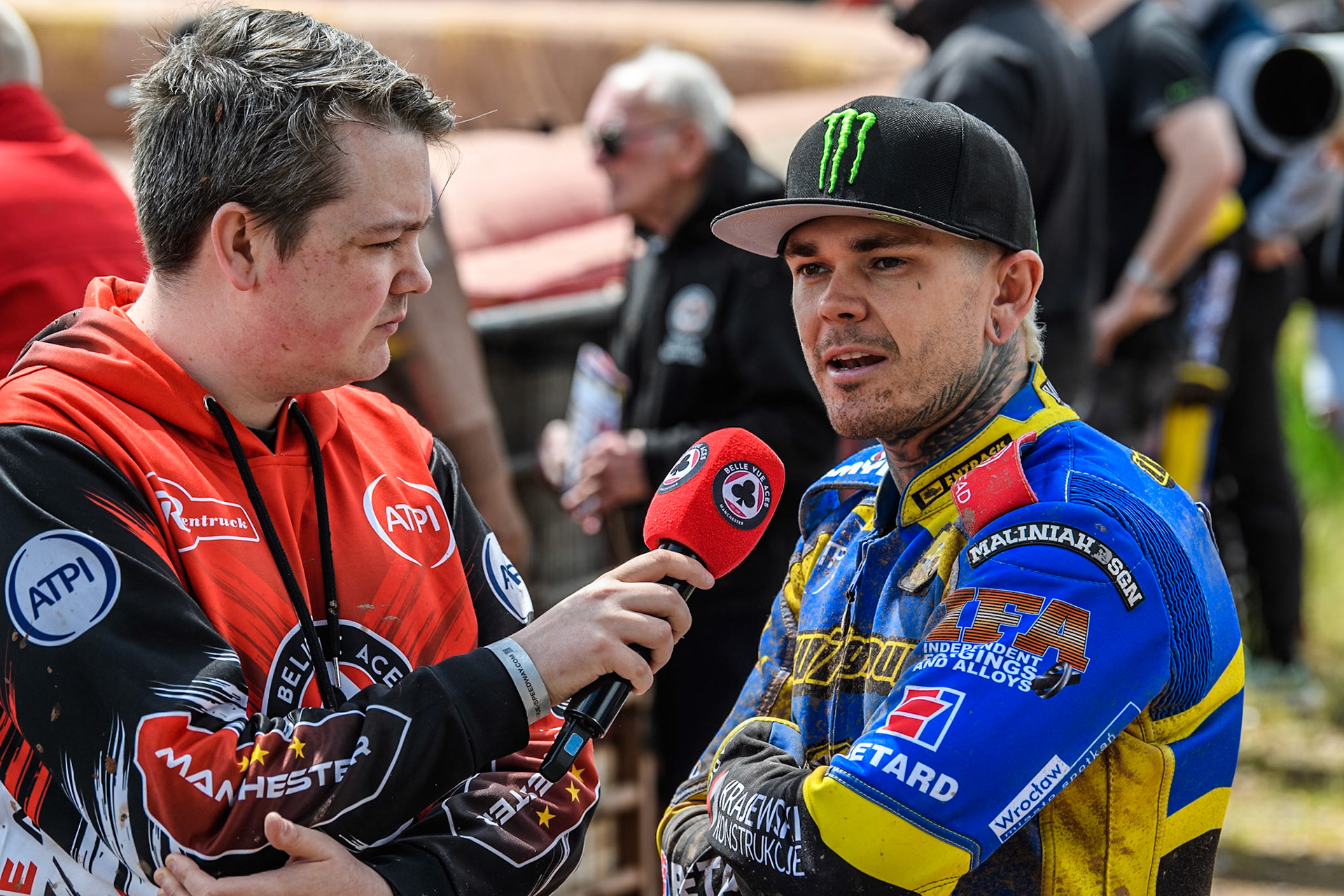 Belle Vue roving reporter Lee Wild (Left) interviews Sheffield Tigers' Tai Woffinden during the Rowe Motor Oil Premiership match between Belle Vue Aces and Sheffield Tigers at the National Speedway Stadium, Manchester on Monday 27th May 2024. (Photo: Ian Charles | MI News)