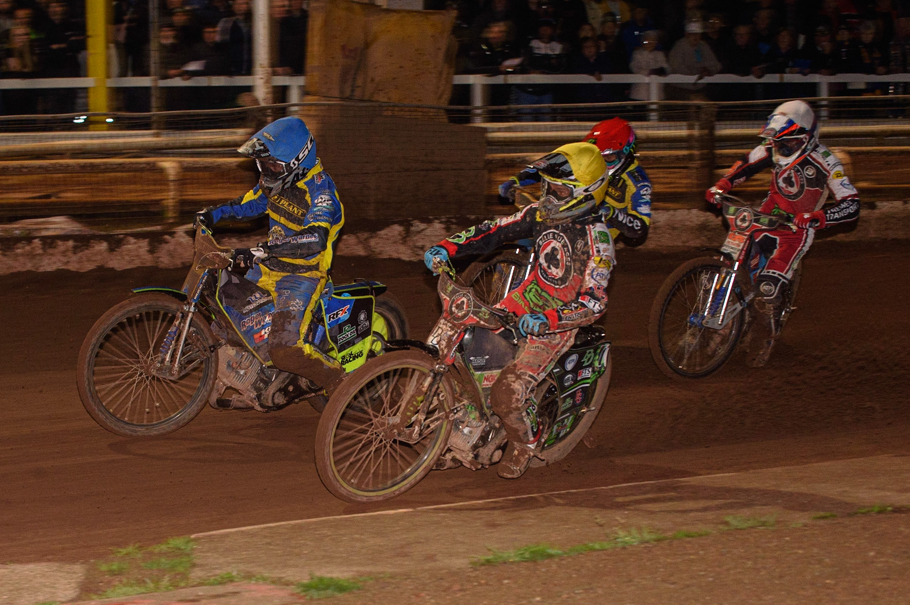 SHEFFIELD, UK. OCT 4THCharles Wright  (Yellow) inside Troy Batchelor  (Blue) with Jack Holder  (Red) and Steve Worrall  (White) behind during the SGB Premiership Semi Final Playoff 1st Leg between Sheffield Tigers and Belle Vue Aces at Owlerton Stadium, Sheffield on Monday 4th October 2021. (Credit: Ian Charles | MI News)