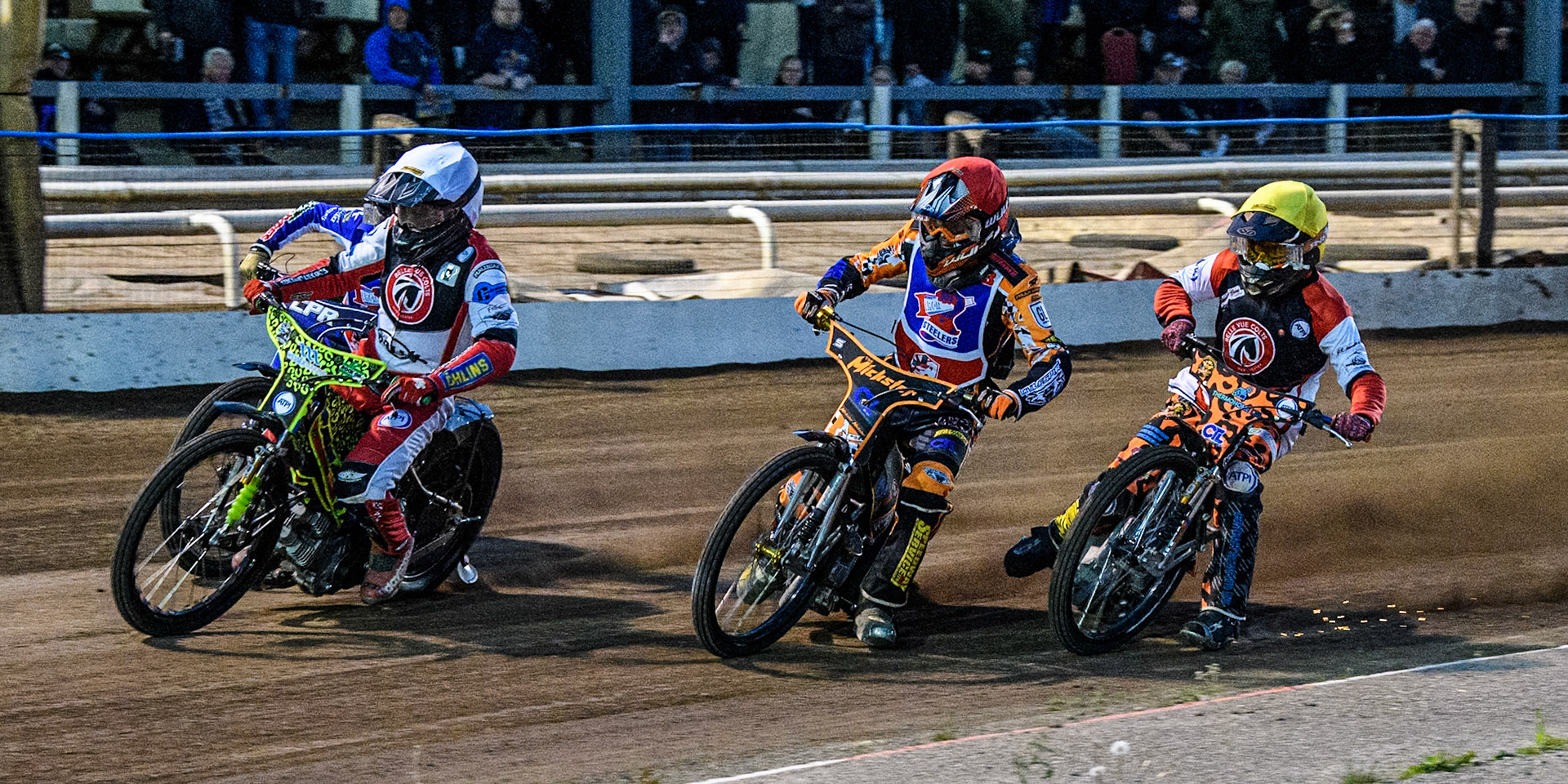 Belle Vue Colts' William Cairns in White leading Steelers' Mickie Simpson in Red, Belle Vue Colts' Guest Rider Cooper Rushen in Yellow and Steelers' Vinnie Foord in Blue during the WSRA National Development League match between Steelers and Belle Vue Colts at Owlerton Stadium, Sheffield on Monday 5th May 2025. (Photo: Ian Charles | MI News)