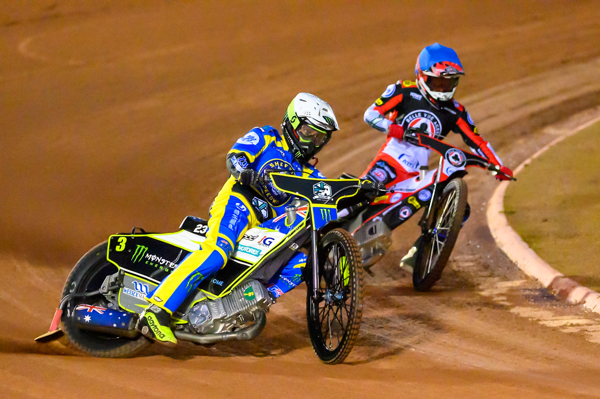 Chris Holder of Sheffield Tigers   in White leading Zach Cook of Belle Vue Aces   in Blue during the Knockout Cup, Northern Section match between Belle Vue Aces and Sheffield Tigers at the National Speedway Stadium, Manchester on Monday 30th March 2026. (Photo: Ian Charles | MI News)
