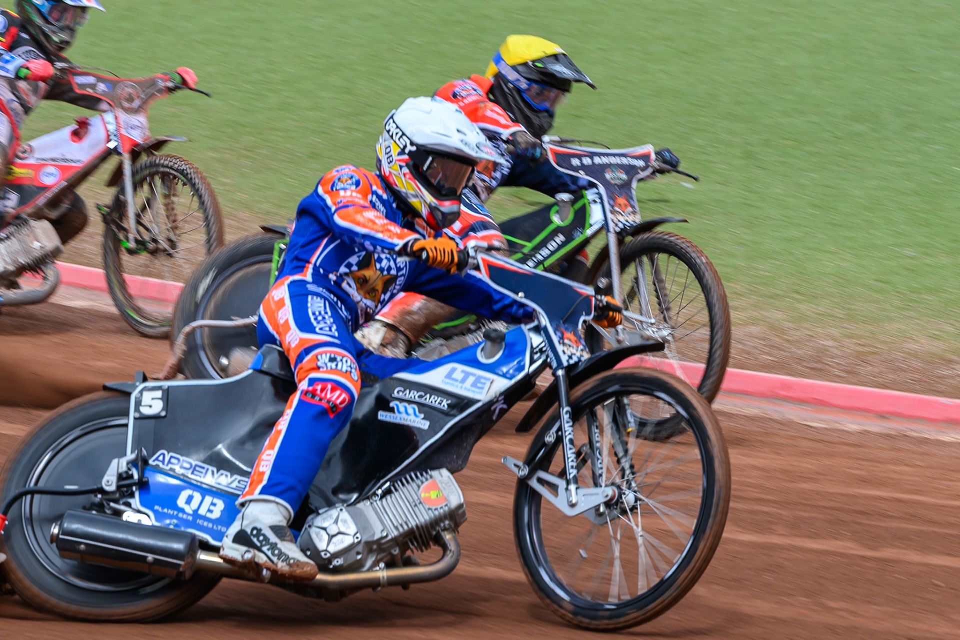 Nicolai Klindt of Northampton Foxes in White rides outside team mate Kye Thomson of Northampton Foxes in Yellow during the Rowe Motor Oil Premiership match between Belle Vue Aces and Northampton Foxes at the National Speedway Stadium, Manchester on Monday 4th May 2026. (Photo: Ian Charles | MI News)
