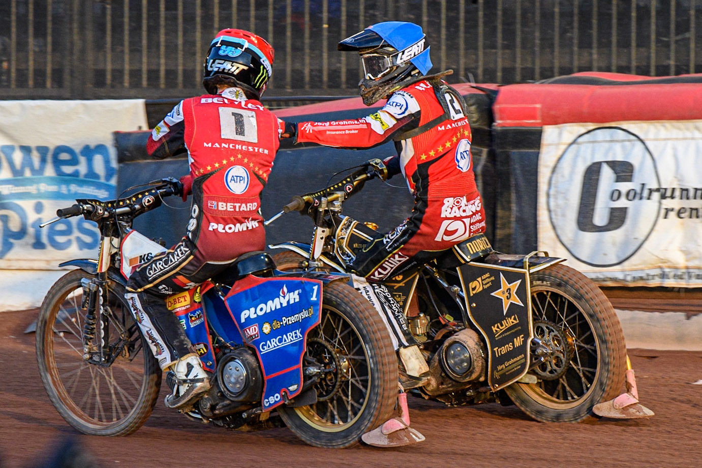 Dan Bewley (Red) and Norick Blodorn (Blue) celebrate their heat win during the Sports Insure Premiership match between Belle Vue Aces and Ipswich Witches at the National Speedway Stadium, Manchester on Monday 17th July 2023. (Photo: Ian Charles | MI News)