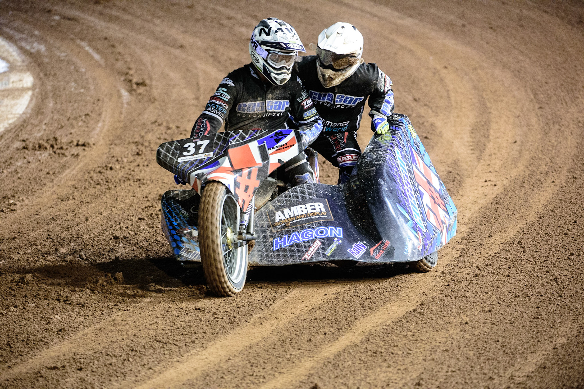 MANCHESTER, UK. OCT 30TH   Mark Cossar &amp; Gareth Williams  after their first heat during the Manchester Masters Sidecar Speedway and Flat Track Racing at the National Speedway Stadium, Manchester on Saturday 30th October 2021. (Credit: Ian Charles | MI News)