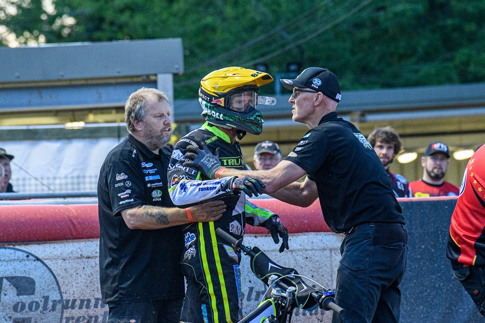 Jason Doyle is held back by his mechanics following an on track incident which upset him during the Sports Insure Premiership match between Belle Vue Aces and Ipswich Witches at the National Speedway Stadium, Manchester on Monday 17th July 2023. (Photo: Ian Charles | MI News)