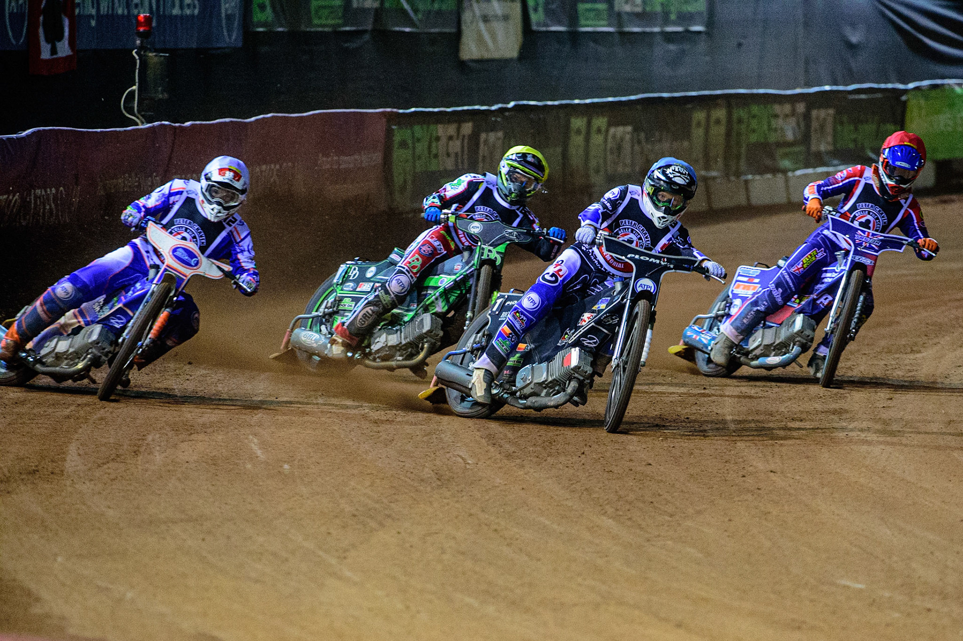 MANCHESTER, UK. OCT 23RD  Dan Bewley (Blue) leads Jason Crump (White), Charles Wright  (Yellow) and Jordan Palin  (Red) during the Peter Craven Memorial Trophy event at the National Speedway Stadium, Manchester on Saturday 23rd October 2021. (Credit: Ian Charles | MI News)