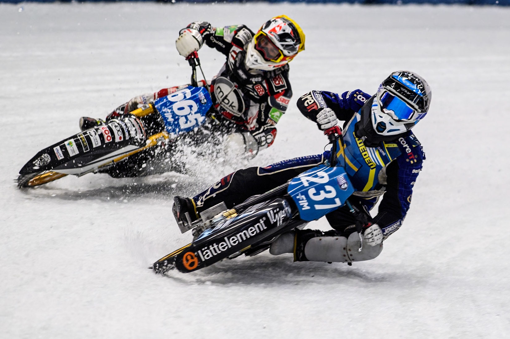 Sweden's Jimmy Hörnell Lidfalk (237) (White) leads  Austria's Charly Ebner (665) (Yellow) during the FIM Ice Speedway Gladiators World Championship Final 2 at the Max-Aicher-Arena, Inzell on Sunday 24 March 2024. (Photo: Ian Charles | MI News)